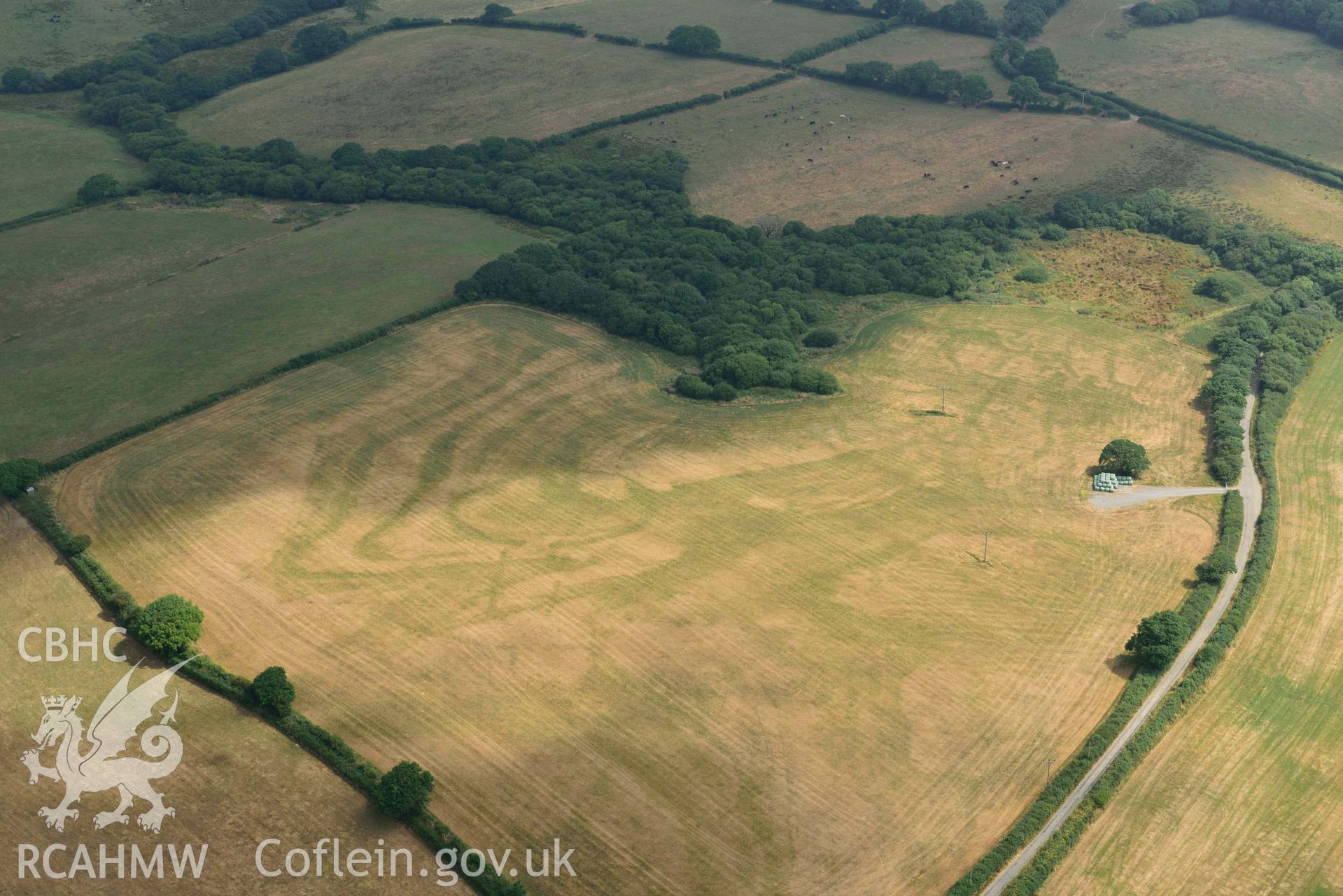 Aerial photography of Island gate farm defended enclosure Aerial reconnaissance survey for the CHERISH Project. Crown Copyright: CHERISH PROJECT 2018. Produced with EU funds through the Ireland Wales Co-operation Programme 2014-2020. All material made freely available through the Open Government Licence.