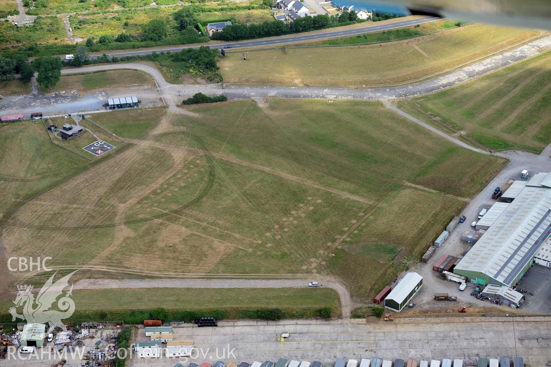 Aerial photography of Carew Cheriton and Milton Airship station Aerial reconnaissance survey for the CHERISH Project. Crown Copyright: CHERISH PROJECT 2018. Produced with EU funds through the Ireland Wales Co-operation Programme 2014-2020. All material made freely available through the Open Government Licence.