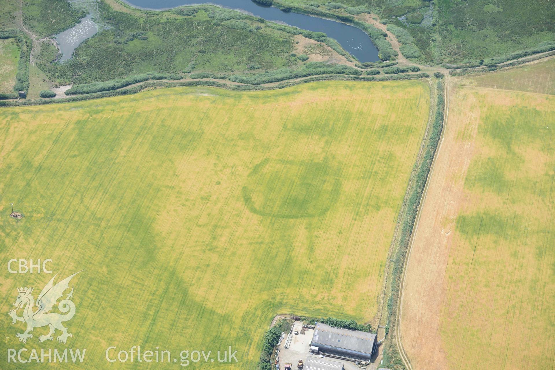 Aerial photography of Trehill Farm defended enclosure, Marloes Aerial reconnaissance survey for the CHERISH Project. Crown Copyright: CHERISH PROJECT 2018. Produced with EU funds through the Ireland Wales Co-operation Programme 2014-2020. All material made freely available through the Open Government Licence.