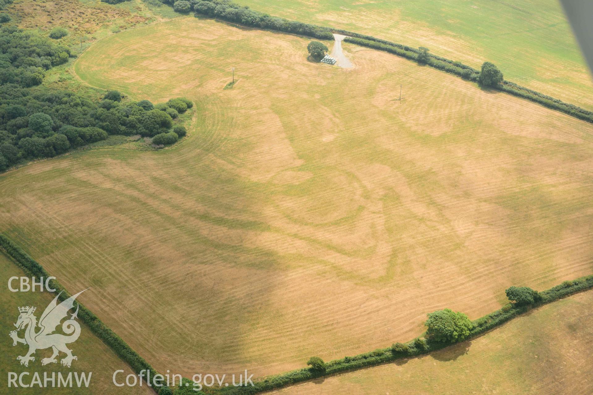 Aerial photography of Island gate farm defended enclosure Aerial reconnaissance survey for the CHERISH Project. Crown Copyright: CHERISH PROJECT 2018. Produced with EU funds through the Ireland Wales Co-operation Programme 2014-2020. All material made freely available through the Open Government Licence.