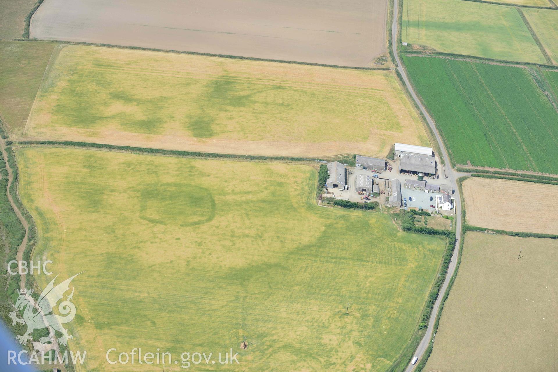 Aerial photography of Trehill Farm defended enclosure, Marloes Aerial reconnaissance survey for the CHERISH Project. Crown Copyright: CHERISH PROJECT 2018. Produced with EU funds through the Ireland Wales Co-operation Programme 2014-2020. All material made freely available through the Open Government Licence.