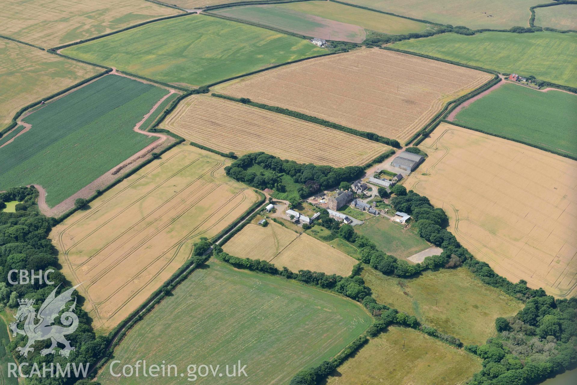 Aerial photography of Butterhill Farm: defended enclosure in southern field Aerial reconnaissance survey for the CHERISH Project. Crown Copyright: CHERISH PROJECT 2018. Produced with EU funds through the Ireland Wales Co-operation Programme 2014-2020. All material made freely available through the Open Government Licence.