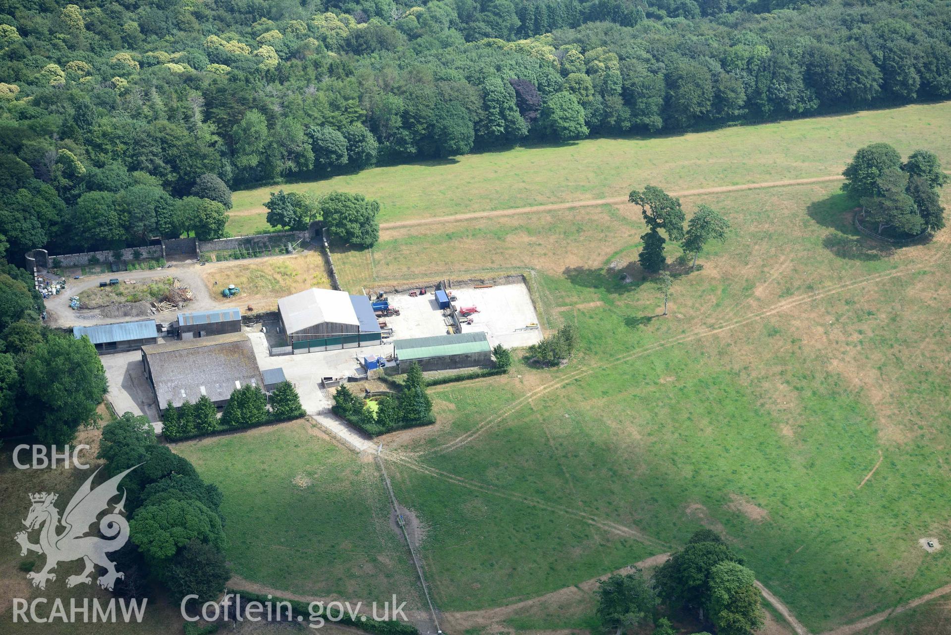 Aerial photography of  Hean Castle and garden Aerial reconnaissance survey for the CHERISH Project. Crown Copyright: CHERISH PROJECT 2018. Produced with EU funds through the Ireland Wales Co-operation Programme 2014-2020. All material made freely available through the Open Government Licence.