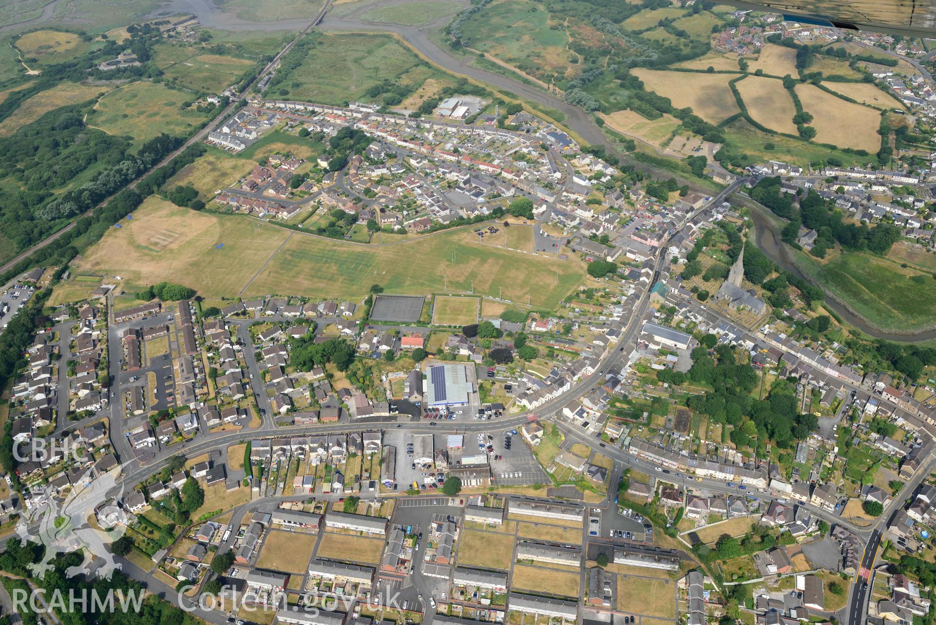 Aerial photography of Kidwell Town & borough with parchmarks in grassland Aerial reconnaissance survey for the CHERISH Project. Crown Copyright: CHERISH PROJECT 2018. Produced with EU funds through the Ireland Wales Co-operation Programme 2014-2020. All material made freely available through the Open Government Licence.