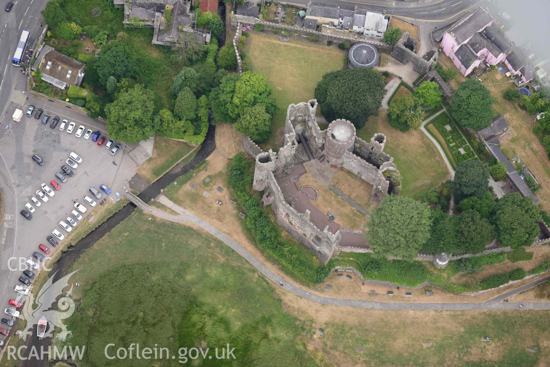 Aerial photography of Laugharne castle and harbour Aerial reconnaissance survey for the CHERISH Project. Crown Copyright: CHERISH PROJECT 2018. Produced with EU funds through the Ireland Wales Co-operation Programme 2014-2020. All material made freely available through the Open Government Licence.