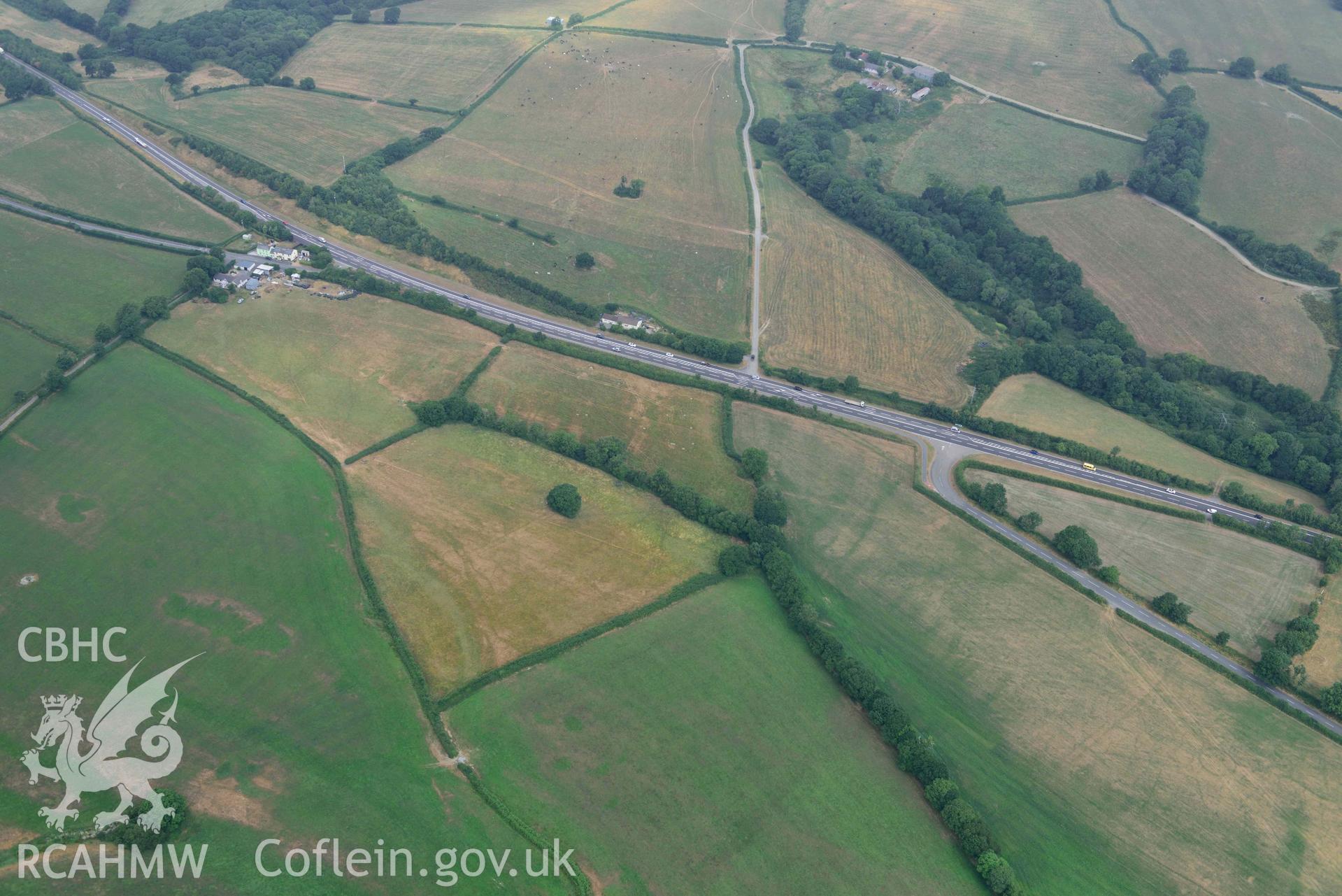 Aerial photography of Round barrow cropmark at Moor Aerial reconnaissance survey for the CHERISH Project. Crown Copyright: CHERISH PROJECT 2018. Produced with EU funds through the Ireland Wales Co-operation Programme 2014-2020. All material made freely available through the Open Government Licence.