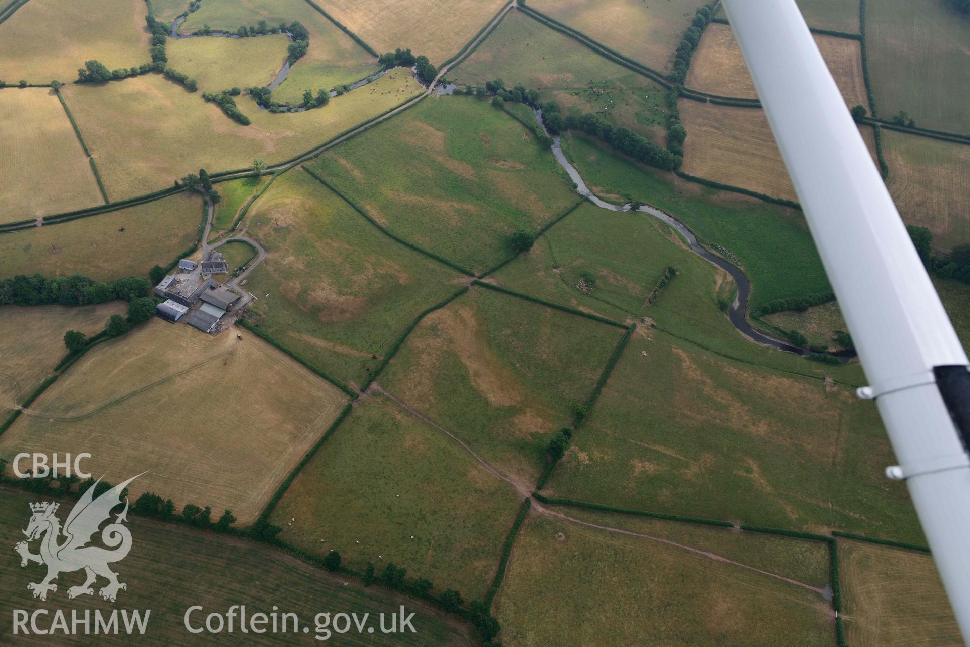 Aerial photography of Roman road, south of Nantllan Aerial reconnaissance survey for the CHERISH Project. Crown Copyright: CHERISH PROJECT 2018. Produced with EU funds through the Ireland Wales Co-operation Programme 2014-2020. All material made freely available through the Open Government Licence.