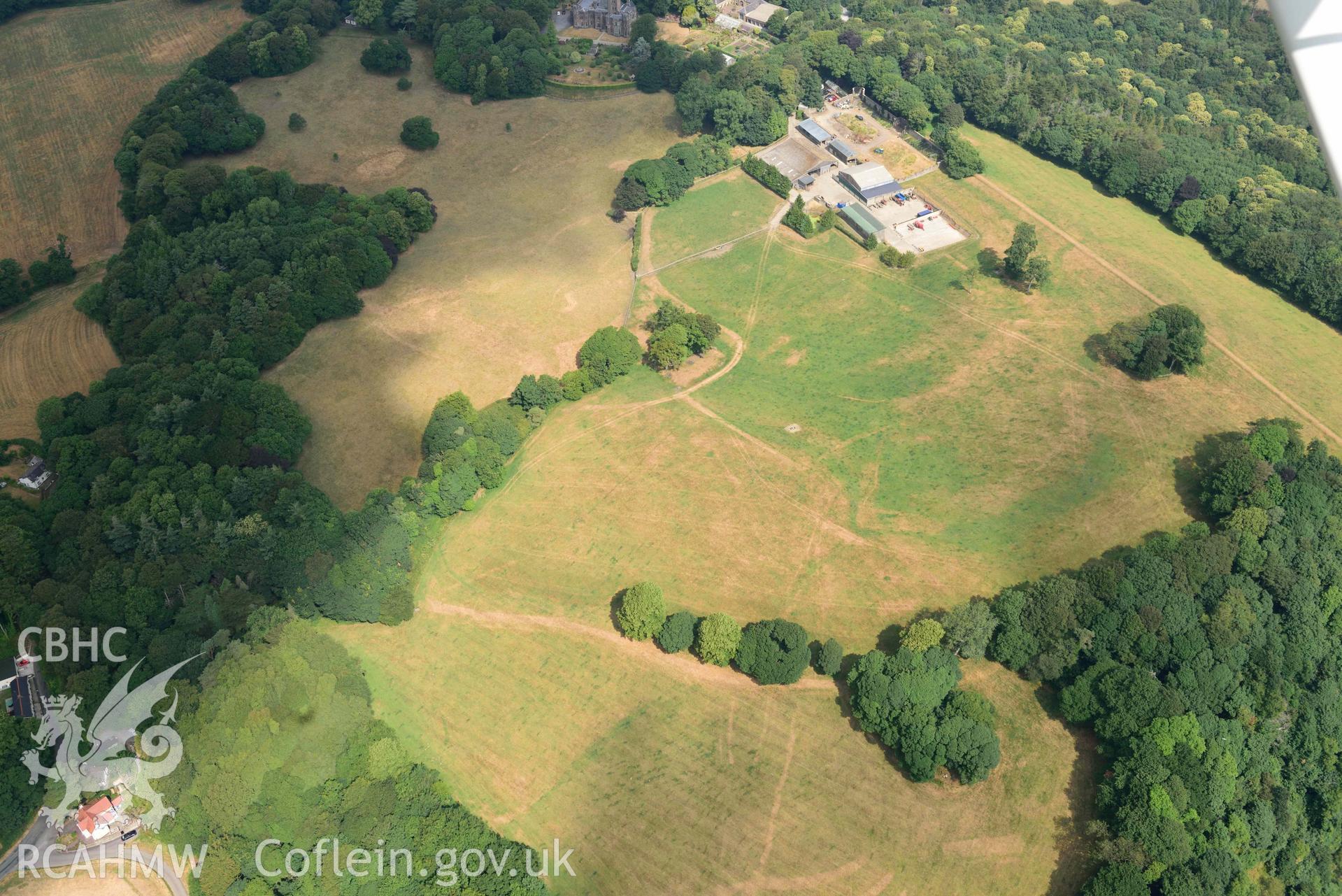 Aerial photography of Hean Castle defended enclosure Aerial reconnaissance survey for the CHERISH Project. Crown Copyright: CHERISH PROJECT 2018. Produced with EU funds through the Ireland Wales Co-operation Programme 2014-2020. All material made freely available through the Open Government Licence.