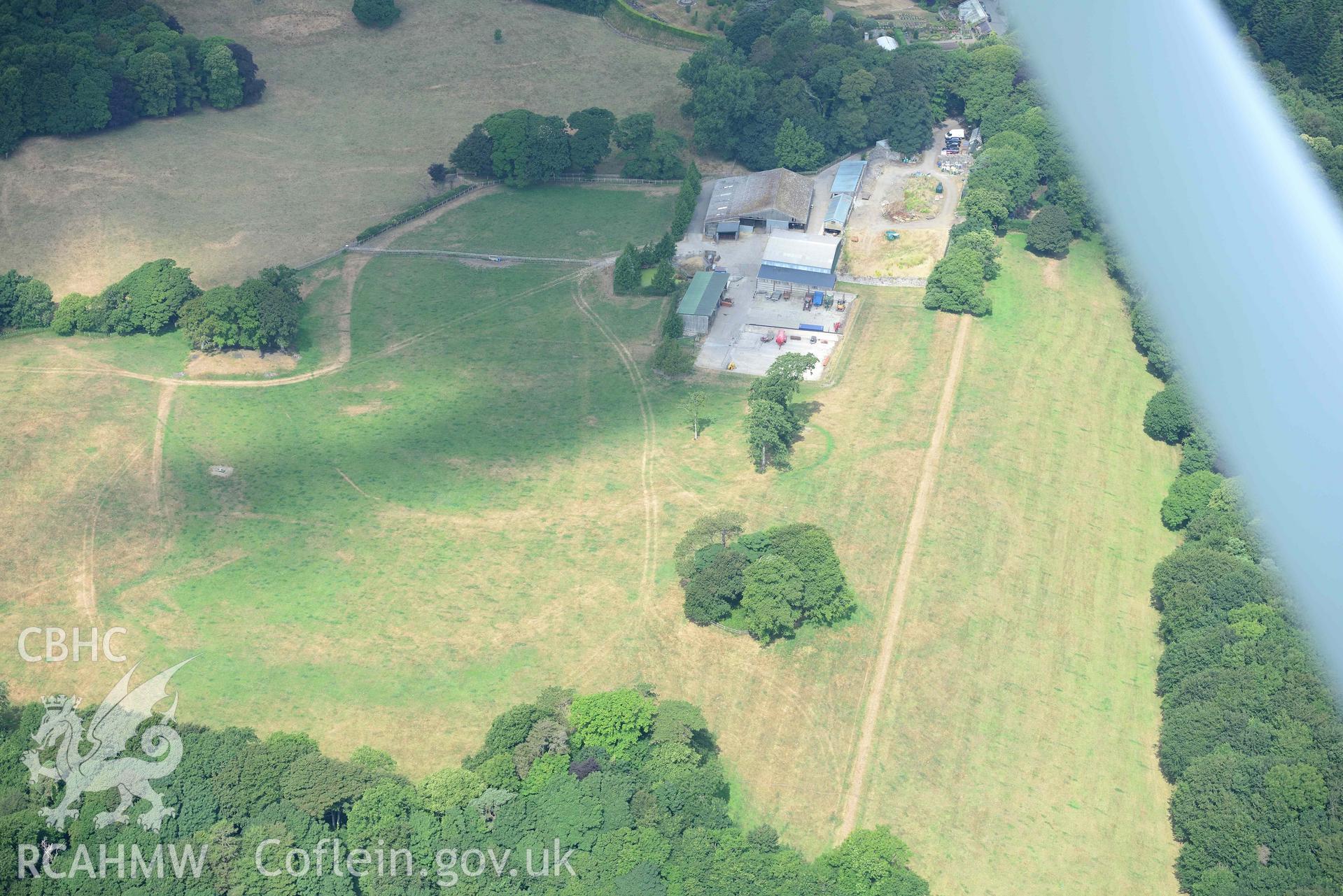 Aerial photography of Hean Castle defended enclosure Aerial reconnaissance survey for the CHERISH Project. Crown Copyright: CHERISH PROJECT 2018. Produced with EU funds through the Ireland Wales Co-operation Programme 2014-2020. All material made freely available through the Open Government Licence.