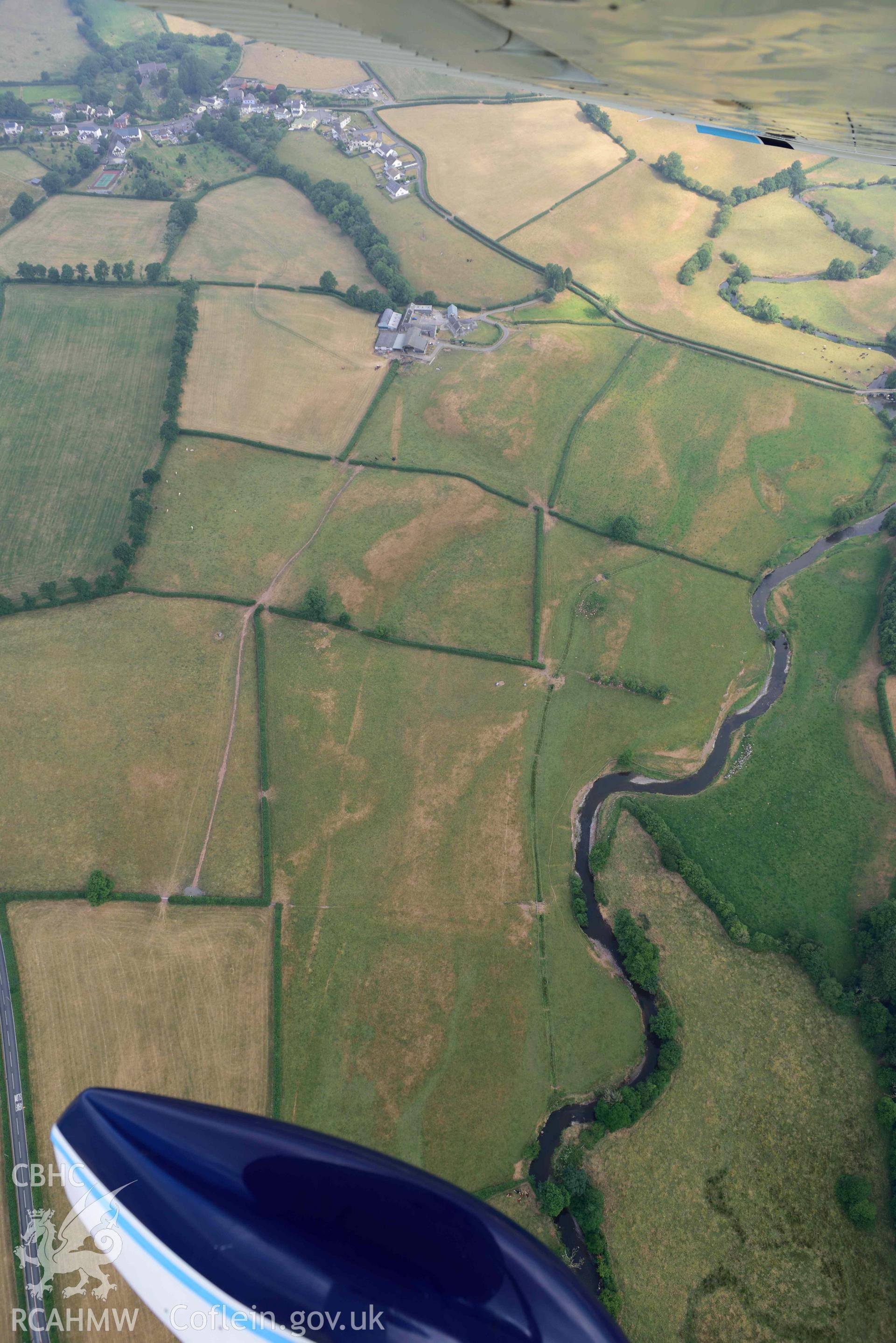 Aerial photography of Roman road, south of Nantllan Aerial reconnaissance survey for the CHERISH Project. Crown Copyright: CHERISH PROJECT 2018. Produced with EU funds through the Ireland Wales Co-operation Programme 2014-2020. All material made freely available through the Open Government Licence.