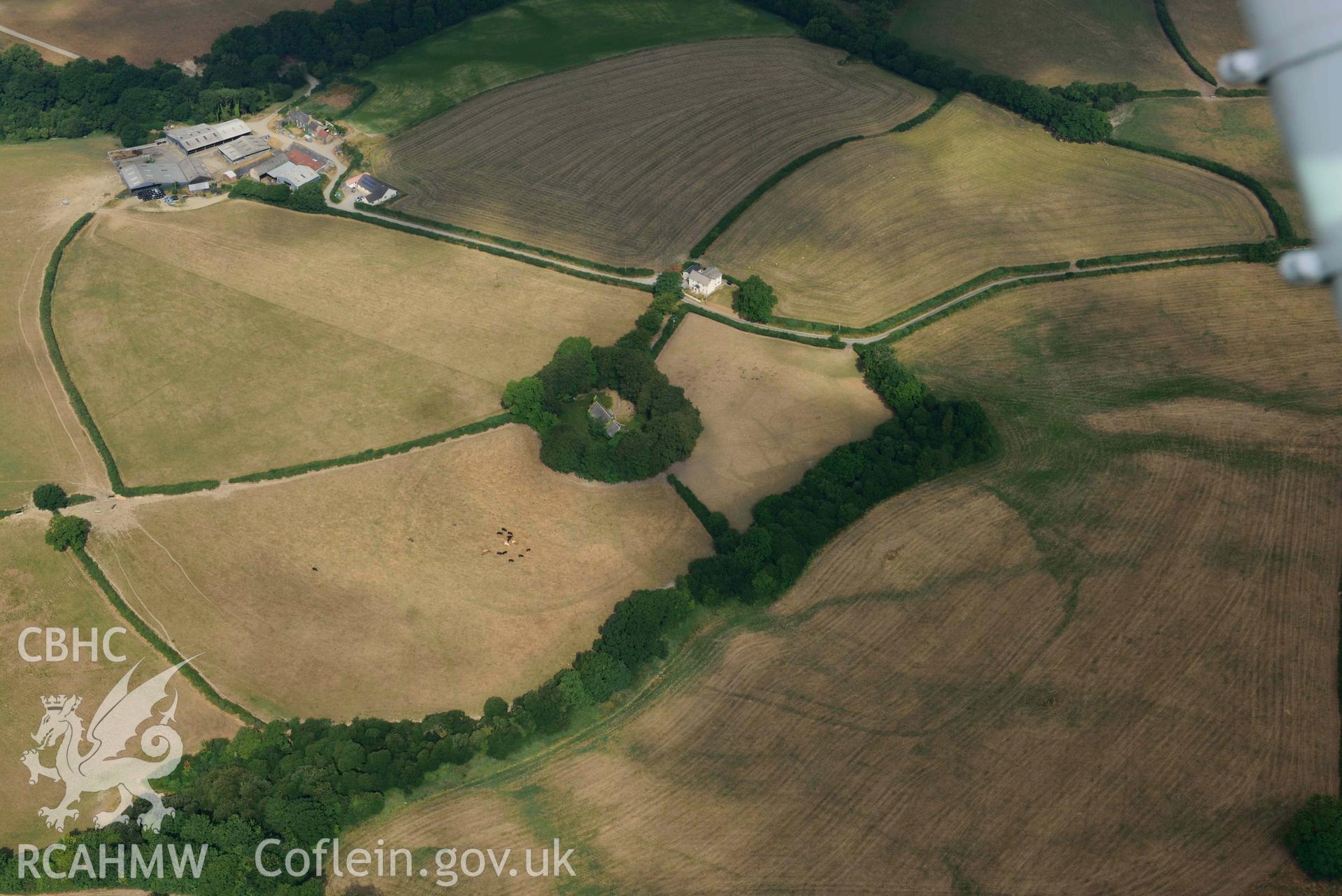 Aerial photography of Llangan Church cropmark enclosure complex Aerial reconnaissance survey for the CHERISH Project. Crown Copyright: CHERISH PROJECT 2018. Produced with EU funds through the Ireland Wales Co-operation Programme 2014-2020. All material made freely available through the Open Government Licence.