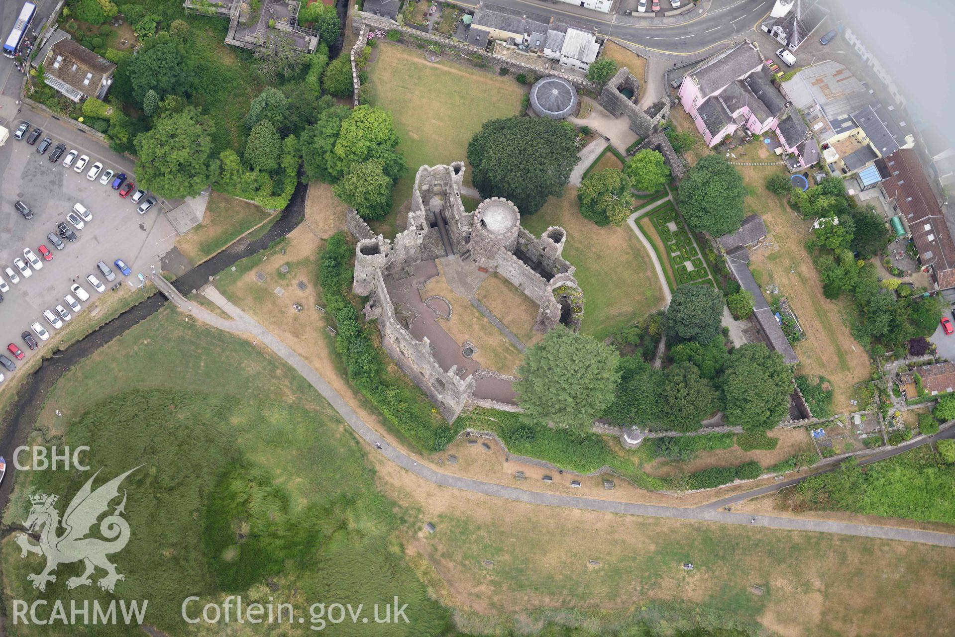 Aerial photography of Laugharne castle and harbour Aerial reconnaissance survey for the CHERISH Project. Crown Copyright: CHERISH PROJECT 2018. Produced with EU funds through the Ireland Wales Co-operation Programme 2014-2020. All material made freely available through the Open Government Licence.