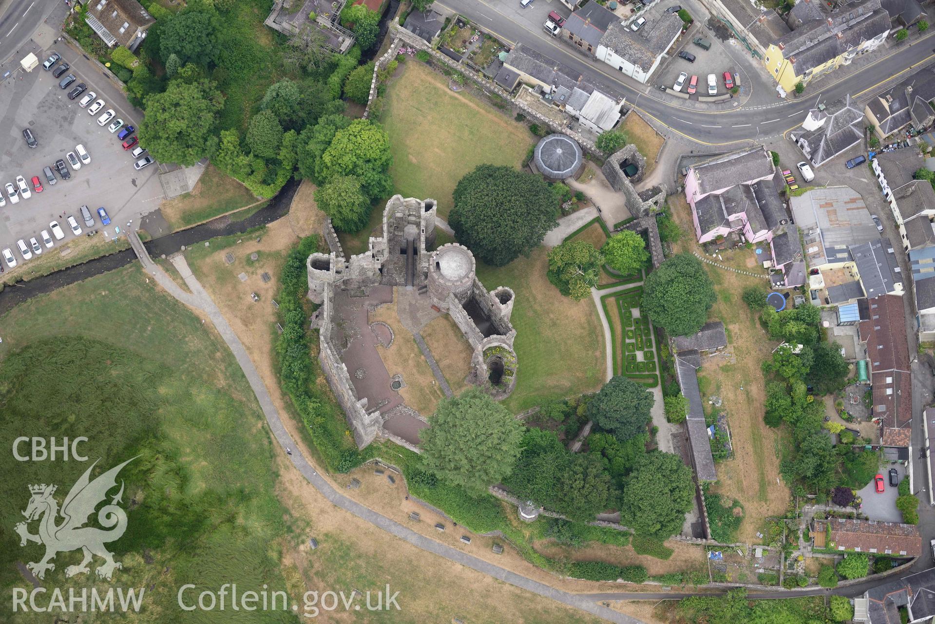 Aerial photography of Laugharne castle and harbour Aerial reconnaissance survey for the CHERISH Project. Crown Copyright: CHERISH PROJECT 2018. Produced with EU funds through the Ireland Wales Co-operation Programme 2014-2020. All material made freely available through the Open Government Licence.