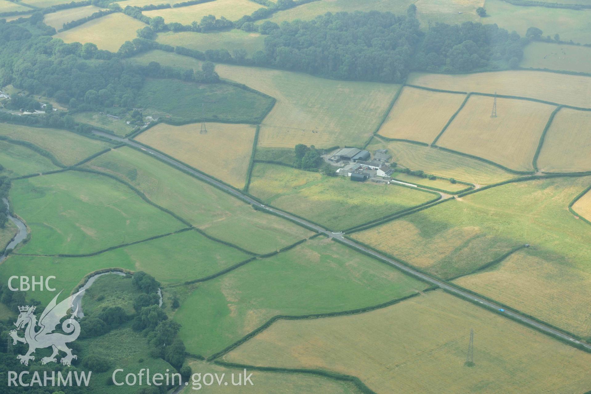 Aerial photography of Roman Road, 60 Carmarthan to Kidwelly at Pontmorlais cottage Aerial reconnaissance survey for the CHERISH Project. Crown Copyright: CHERISH PROJECT 2018. Produced with EU funds through the Ireland Wales Co-operation Programme 2014-2020. All material made freely available through the Open Government Licence.