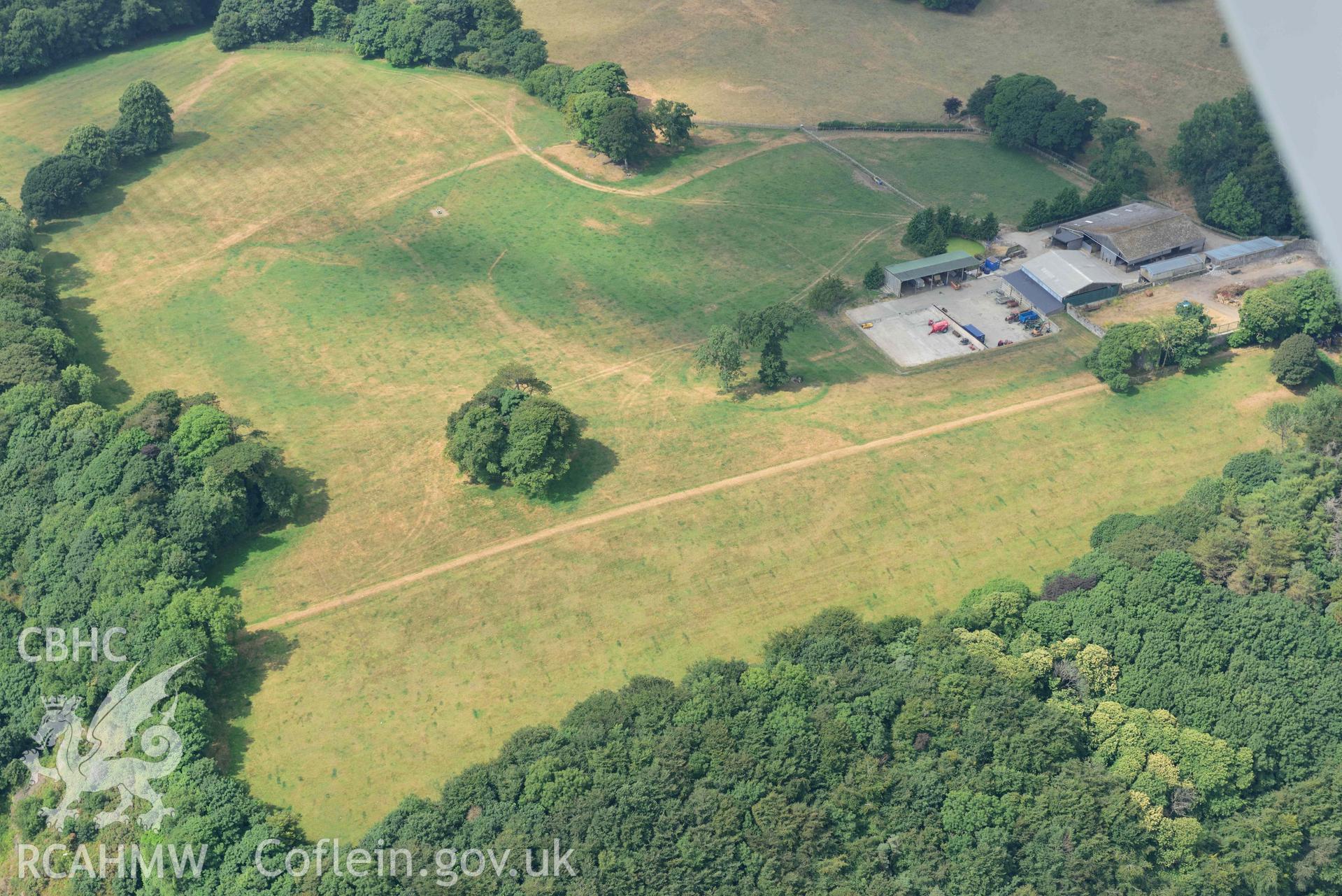 Aerial photography of Hean Castle defended enclosure Aerial reconnaissance survey for the CHERISH Project. Crown Copyright: CHERISH PROJECT 2018. Produced with EU funds through the Ireland Wales Co-operation Programme 2014-2020. All material made freely available through the Open Government Licence.