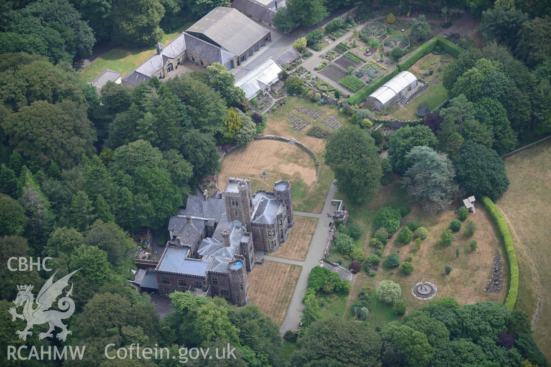 Aerial photography of  Hean Castle and garden Aerial reconnaissance survey for the CHERISH Project. Crown Copyright: CHERISH PROJECT 2018. Produced with EU funds through the Ireland Wales Co-operation Programme 2014-2020. All material made freely available through the Open Government Licence.