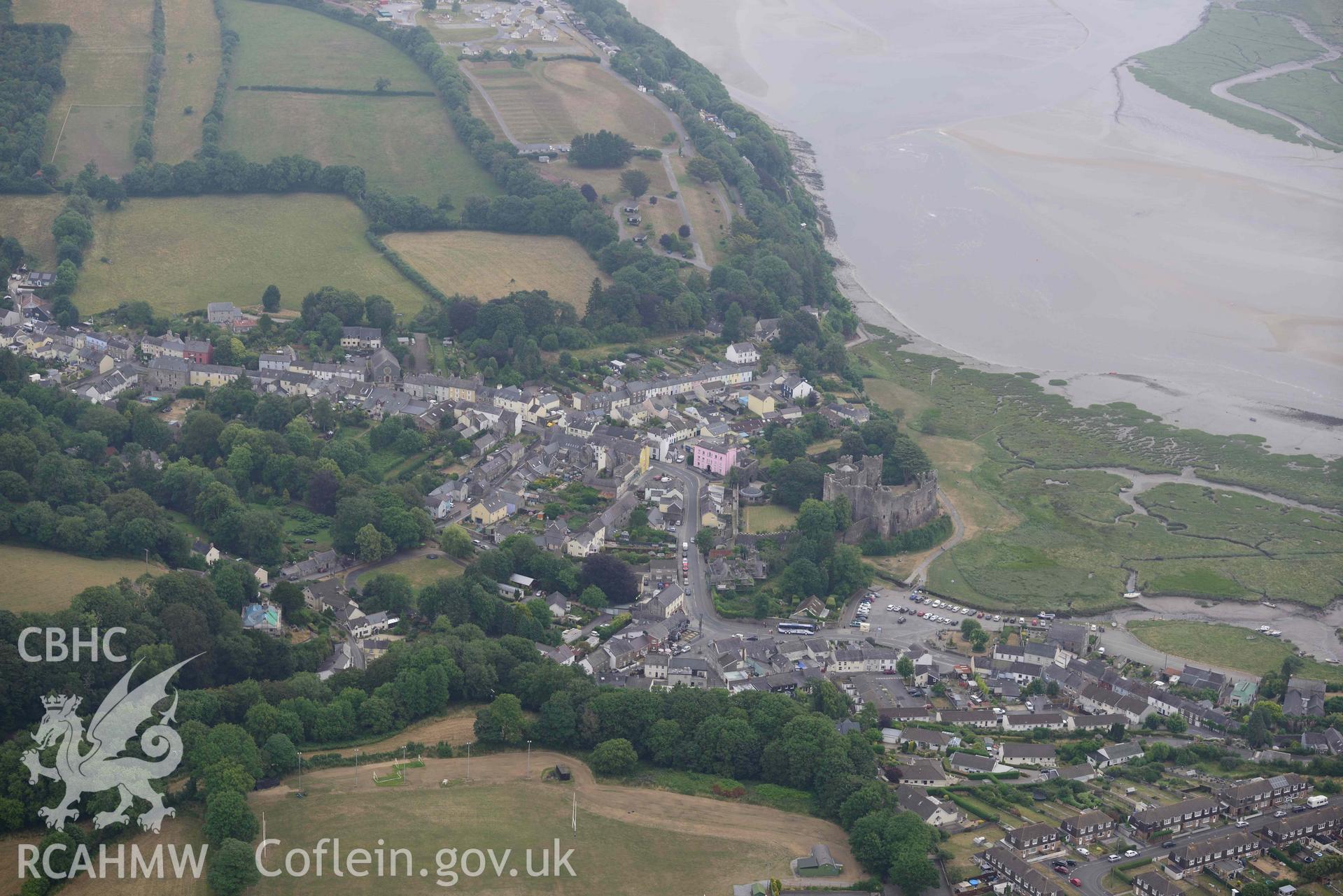 Aerial photography of Laugharne castle and harbour Aerial reconnaissance survey for the CHERISH Project. Crown Copyright: CHERISH PROJECT 2018. Produced with EU funds through the Ireland Wales Co-operation Programme 2014-2020. All material made freely available through the Open Government Licence.