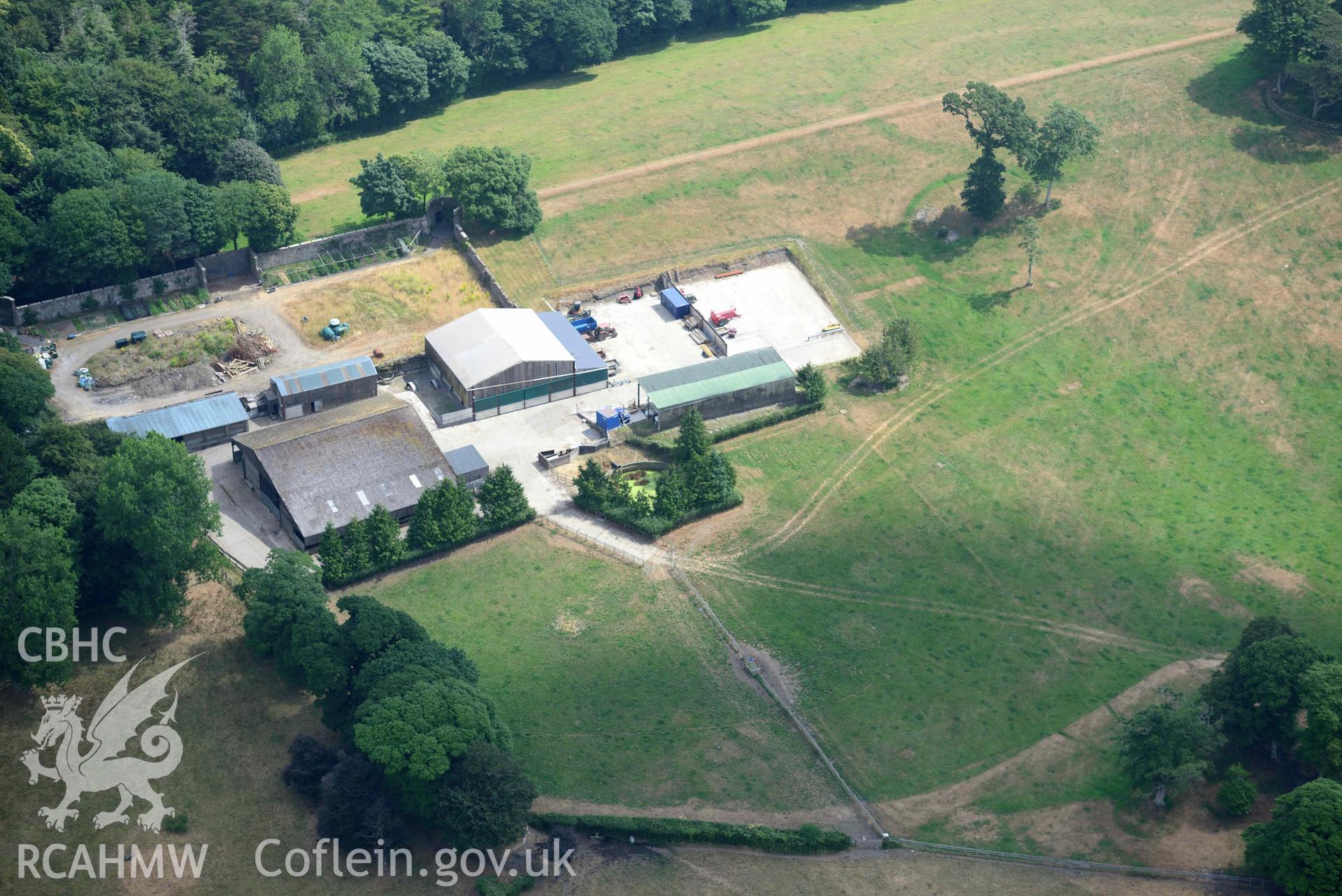 Aerial photography of  Hean Castle and garden Aerial reconnaissance survey for the CHERISH Project. Crown Copyright: CHERISH PROJECT 2018. Produced with EU funds through the Ireland Wales Co-operation Programme 2014-2020. All material made freely available through the Open Government Licence.