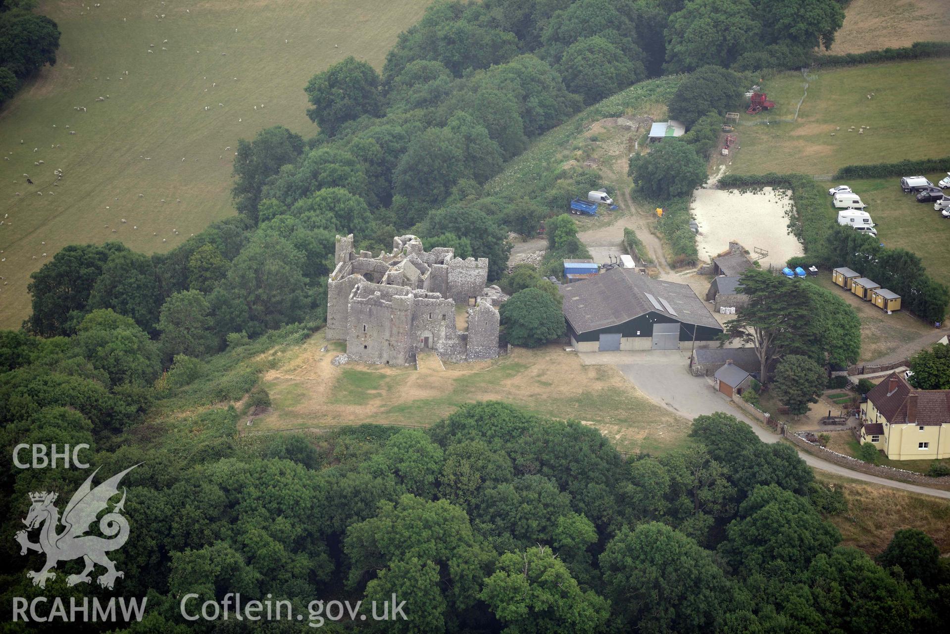 Aerial photography of Weobley Castle from the west Aerial reconnaissance survey for the CHERISH Project. Crown Copyright: CHERISH PROJECT 2018. Produced with EU funds through the Ireland Wales Co-operation Programme 2014-2020. All material made freely available through the Open Government Licence.