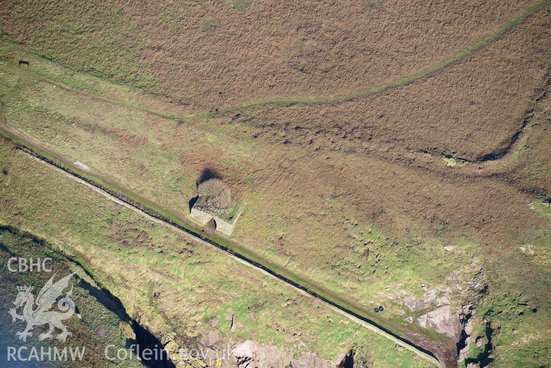 Aerial photo of Skokholm lighthouse.  Aerial reconnaissance survey for the CHERISH Project. Crown Copyright: CHERISH PROJECT 2018. Produced with EU funds through the Ireland Wales Co-operation Programme 2014-2020. All material made freely available through the Open Government Licence.