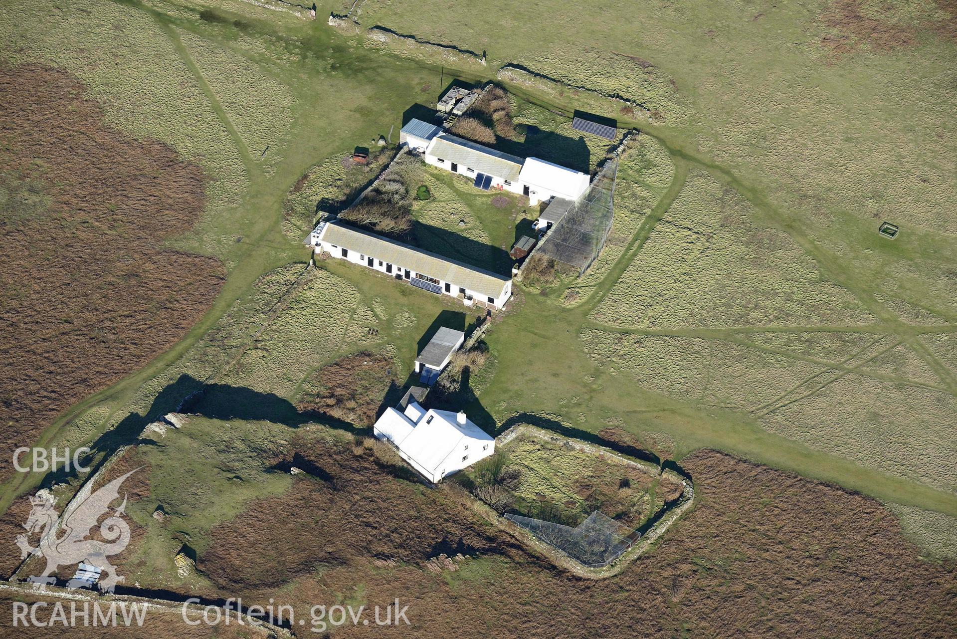 Aerial photo of Skokholm lighthouse.  Aerial reconnaissance survey for the CHERISH Project. Crown Copyright: CHERISH PROJECT 2018. Produced with EU funds through the Ireland Wales Co-operation Programme 2014-2020. All material made freely available through the Open Government Licence.