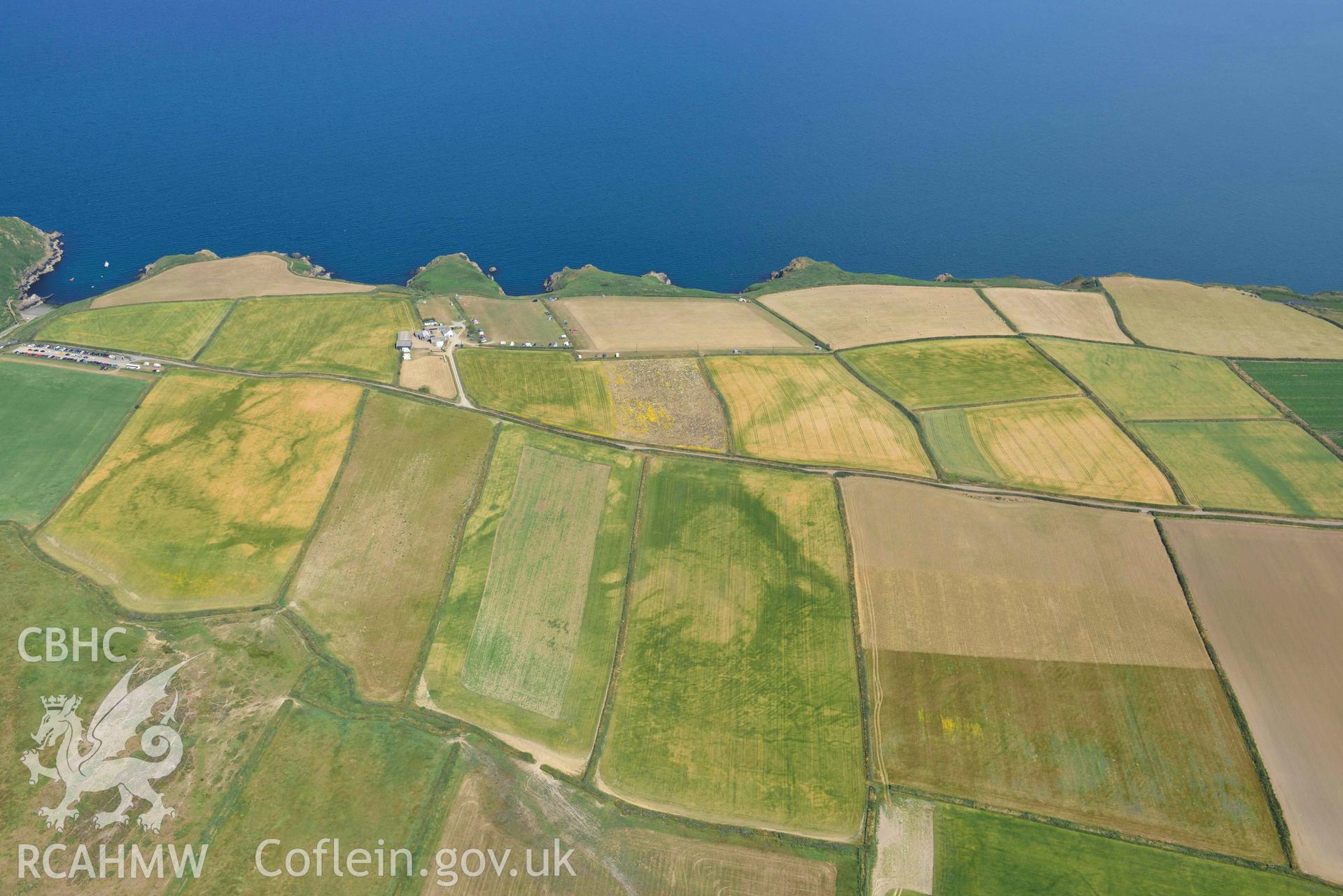 Aerial photography of Non, arch cropmarks between West Hook and Martins Haven Aerial reconnaissance survey for the CHERISH Project. Crown Copyright: CHERISH PROJECT 2018. Produced with EU funds through the Ireland Wales Co-operation Programme 2014-2020. All material made freely available through the Open Government Licence.