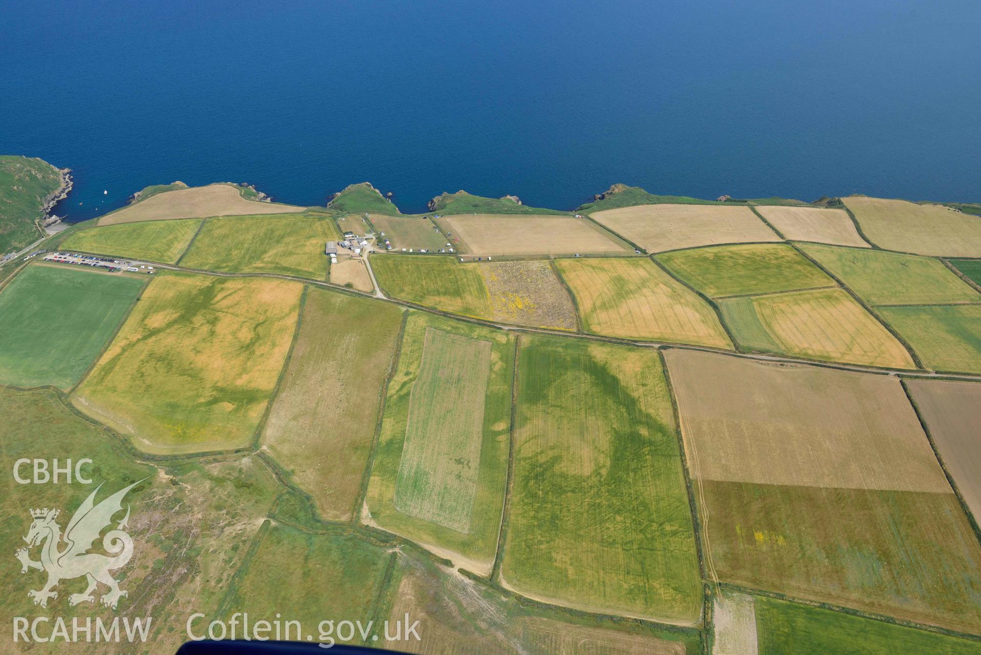 Aerial photography of Non, arch cropmarks between West Hook and Martins Haven Aerial reconnaissance survey for the CHERISH Project. Crown Copyright: CHERISH PROJECT 2018. Produced with EU funds through the Ireland Wales Co-operation Programme 2014-2020. All material made freely available through the Open Government Licence.