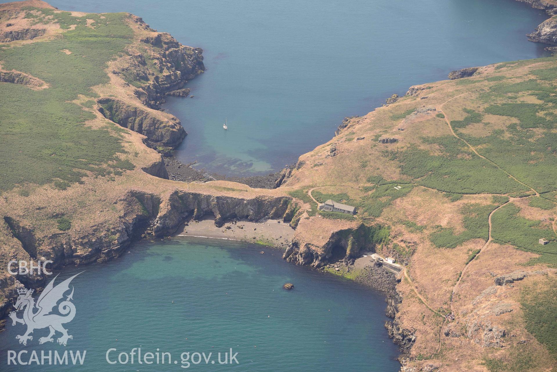 Aerial photography of Skomer Island: Warden's House and Neck Isthmus Aerial reconnaissance survey for the CHERISH Project. Crown Copyright: CHERISH PROJECT 2018. Produced with EU funds through the Ireland Wales Co-operation Programme 2014-2020. All material made freely available through the Open Government Licence.