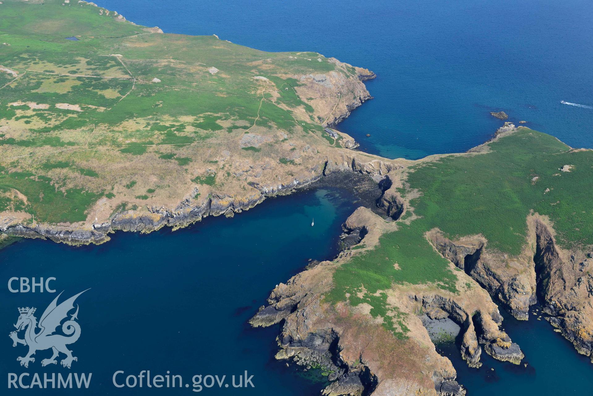 Aerial photography of Skomer Island: Warden's House and Neck Isthmus Aerial reconnaissance survey for the CHERISH Project. Crown Copyright: CHERISH PROJECT 2018. Produced with EU funds through the Ireland Wales Co-operation Programme 2014-2020. All material made freely available through the Open Government Licence.