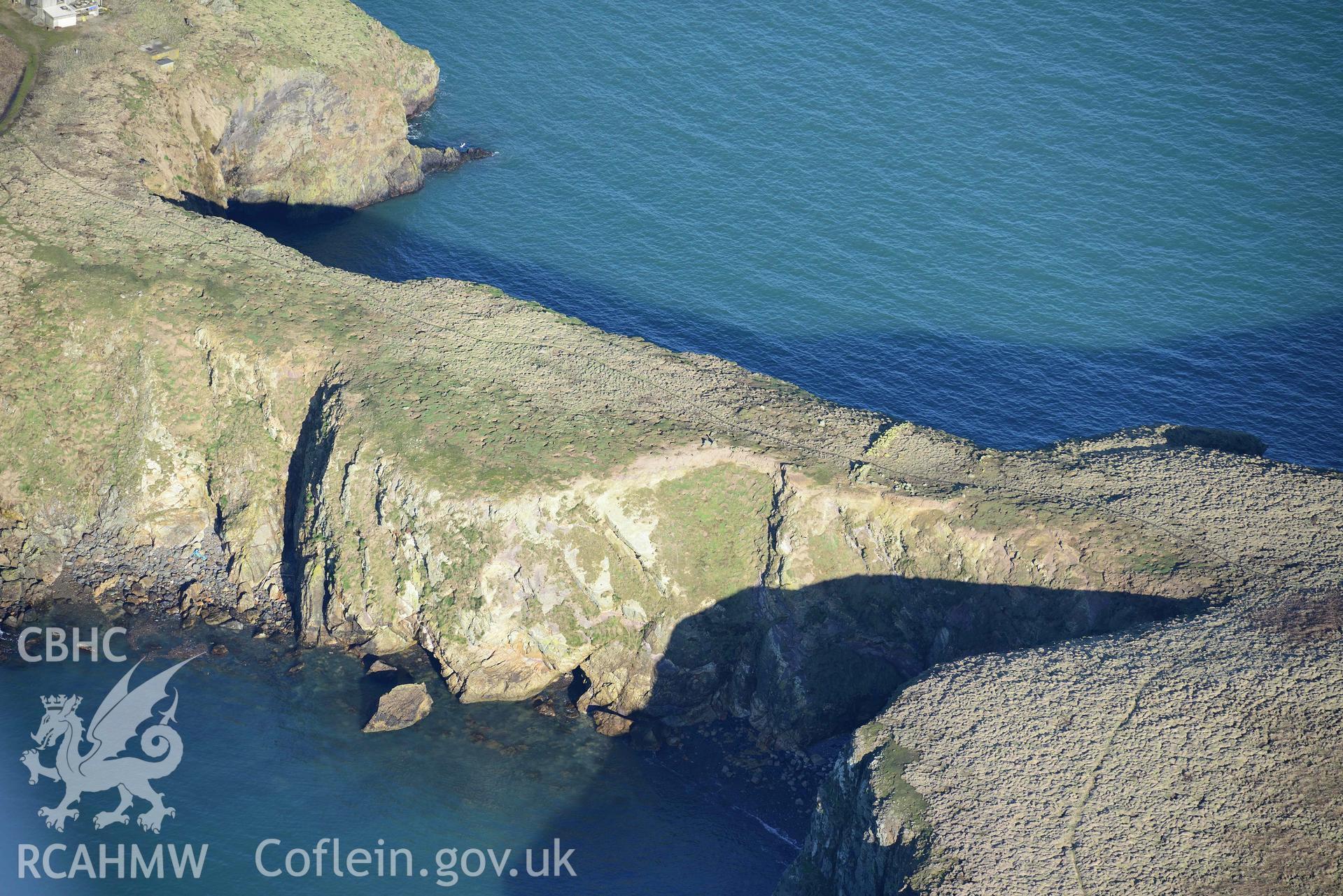 Aerial photo of Skomer Neck.  Aerial reconnaissance survey for the CHERISH Project. Crown Copyright: CHERISH PROJECT 2018. Produced with EU funds through the Ireland Wales Co-operation Programme 2014-2020. All material made freely available through the Open Government Licence.