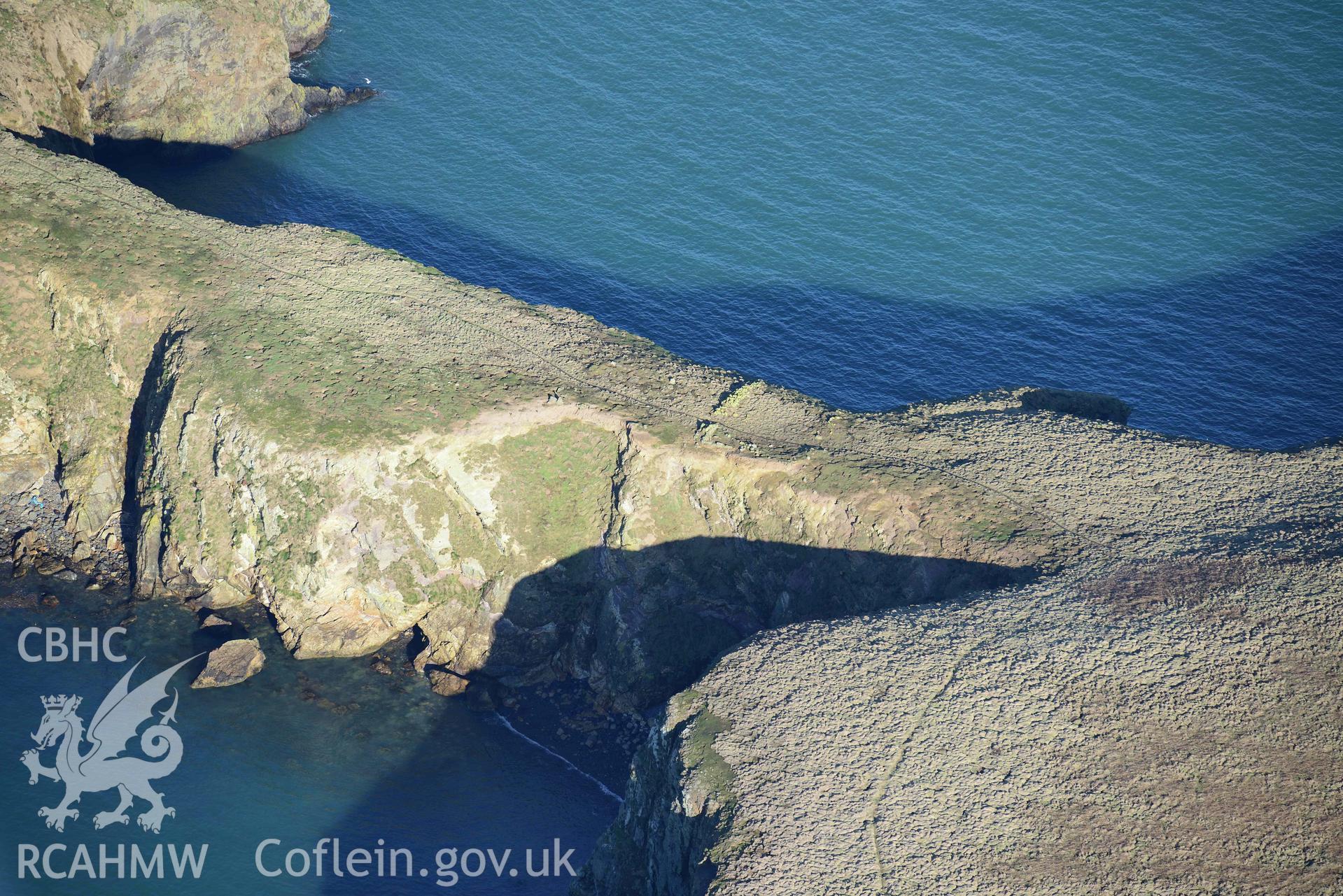 Aerial photo of Skomer Neck.  Aerial reconnaissance survey for the CHERISH Project. Crown Copyright: CHERISH PROJECT 2018. Produced with EU funds through the Ireland Wales Co-operation Programme 2014-2020. All material made freely available through the Open Government Licence.