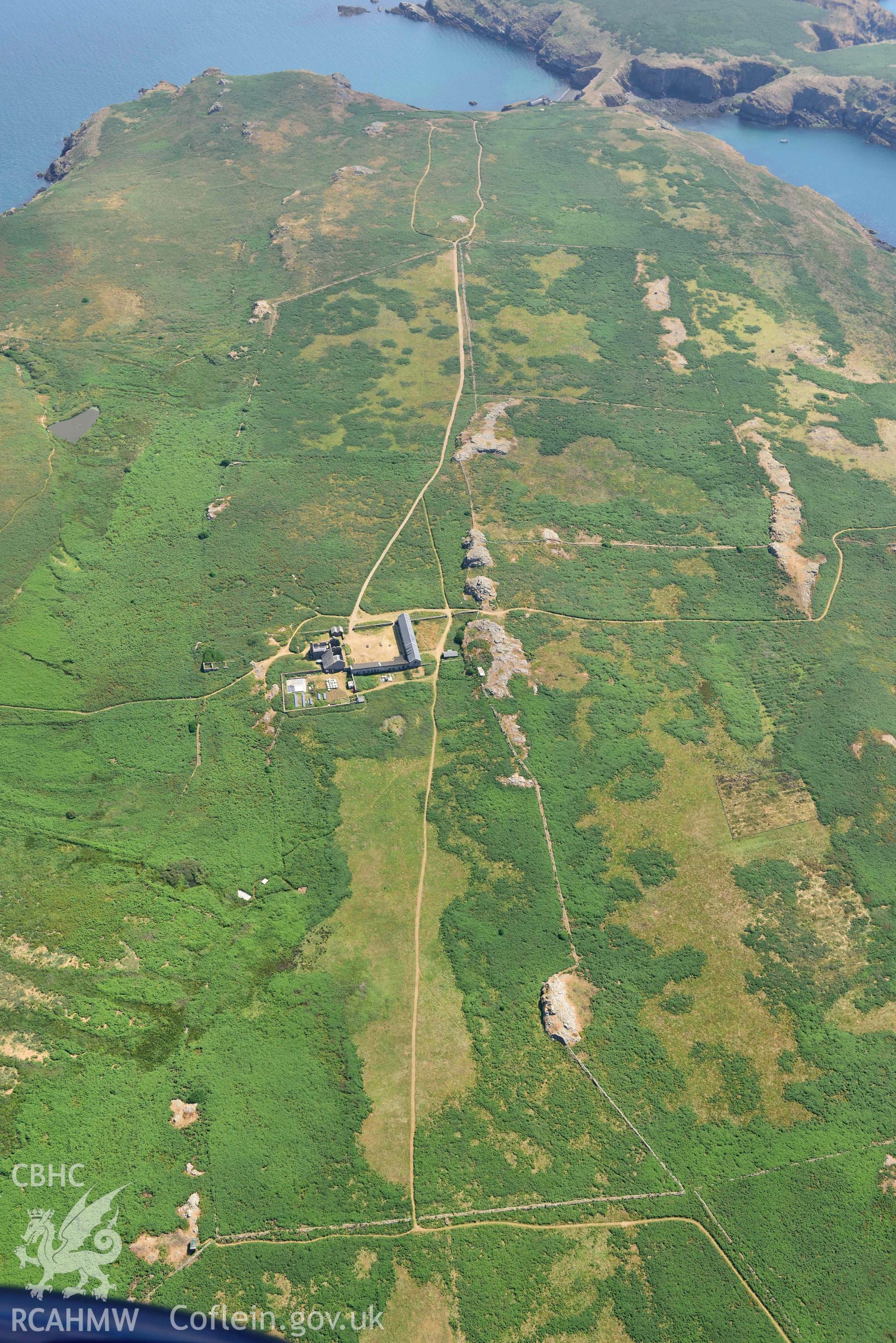 Aerial photography of Old Farm Skomer, Skomer Island Aerial reconnaissance survey for the CHERISH Project. Crown Copyright: CHERISH PROJECT 2018. Produced with EU funds through the Ireland Wales Co-operation Programme 2014-2020. All material made freely available through the Open Government Licence.