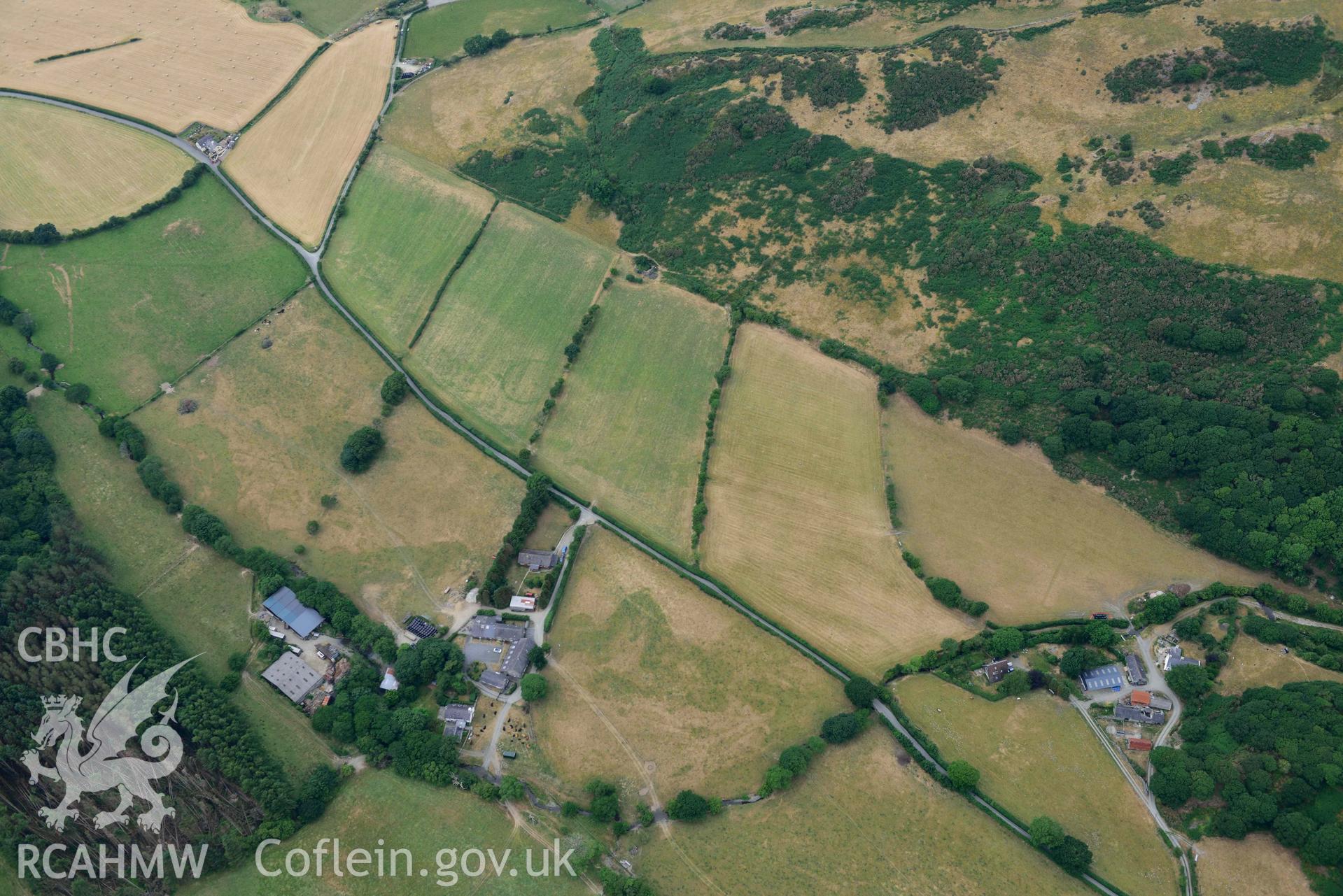 Aerial photograph: Allt-lwyd, Cwm Maethlon round barrow cropmarks. Crown: CHERISH PROJECT 2018. Produced with EU funds through the Ireland Wales Co-operation Programme 2014-2020 (NGR SH631985)