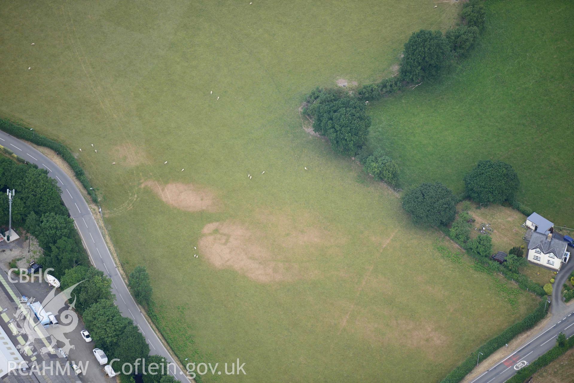 Aerial photograph: Bryncrug, Pont y Felindre, square barrow cemetery. Crown: CHERISH PROJECT 2018. Produced with EU funds through the Ireland Wales Co-operation Programme 2014-2020 (NGR SH613032)