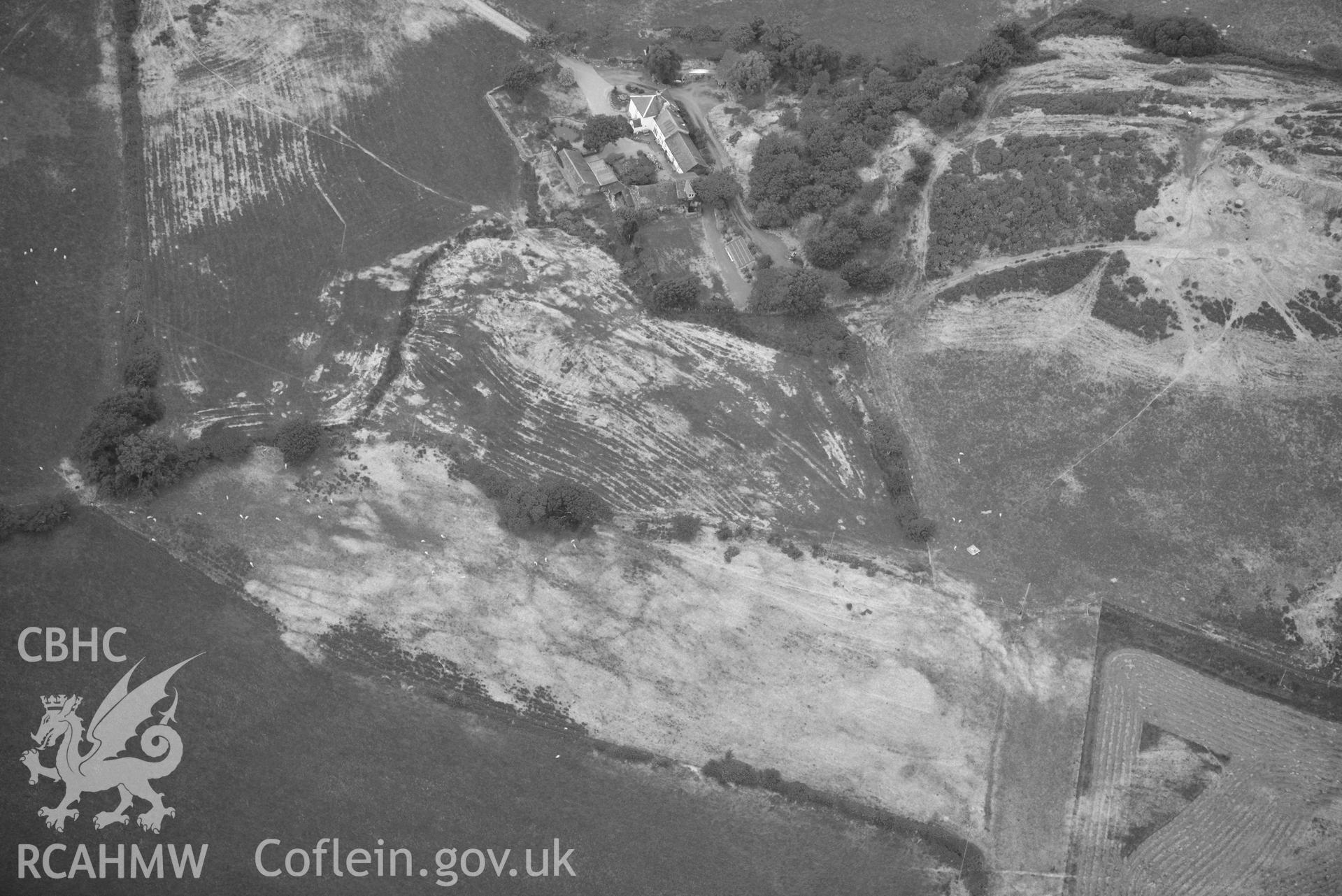 Aerial photograph: Braichyrhenllys, parchmarks of ring ditch or circular enclosure south-east of farm. Crown: CHERISH PROJECT 2018. Produced with EU funds through the Ireland Wales Co-operation Programme 2014-2020 (NGR SH615034)