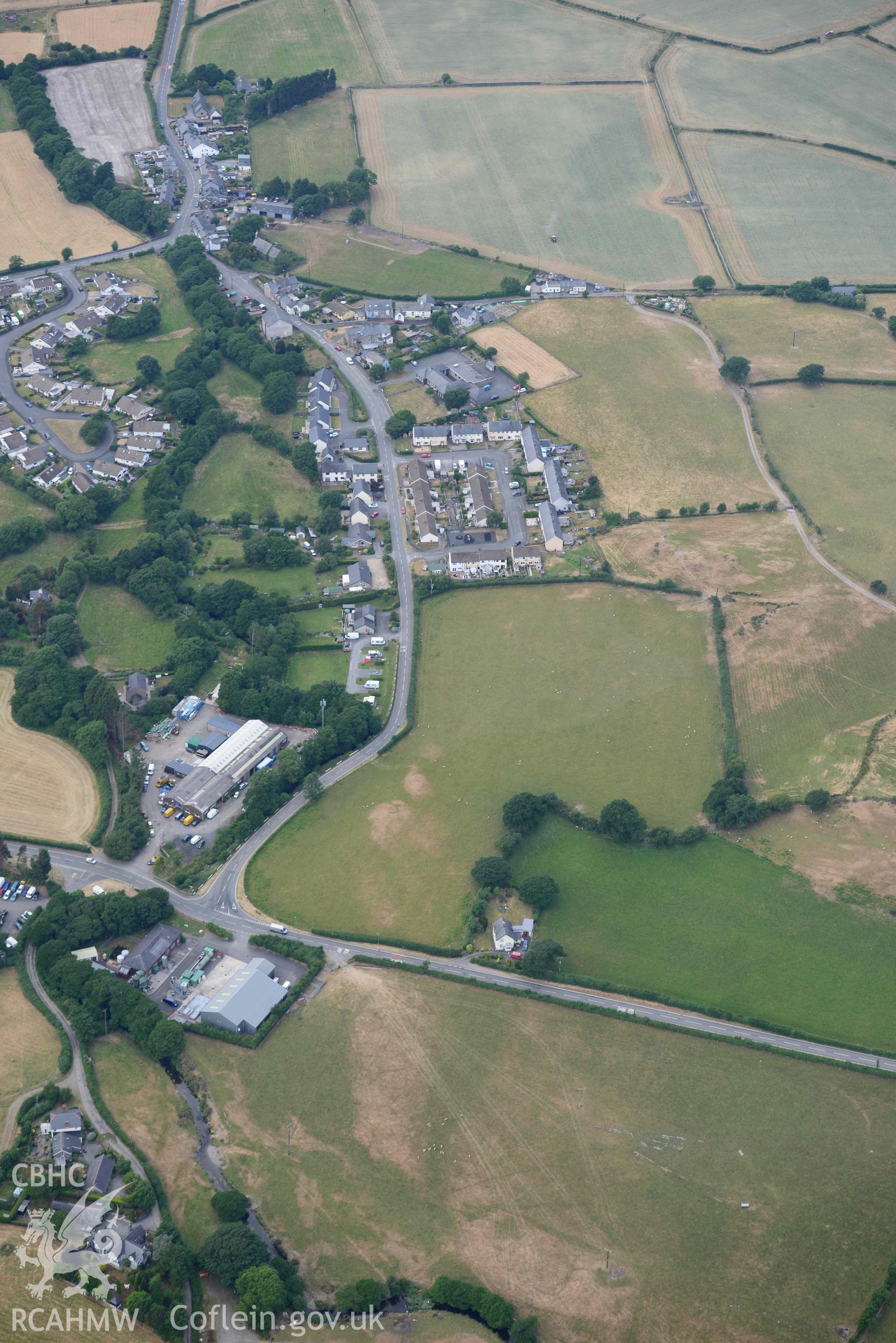 Aerial photograph: Bryncrug, Pont y Felindre cropmark complex. Crown: CHERISH PROJECT 2018. Produced with EU funds through the Ireland Wales Co-operation Programme 2014-2020 (NGR SH616031)