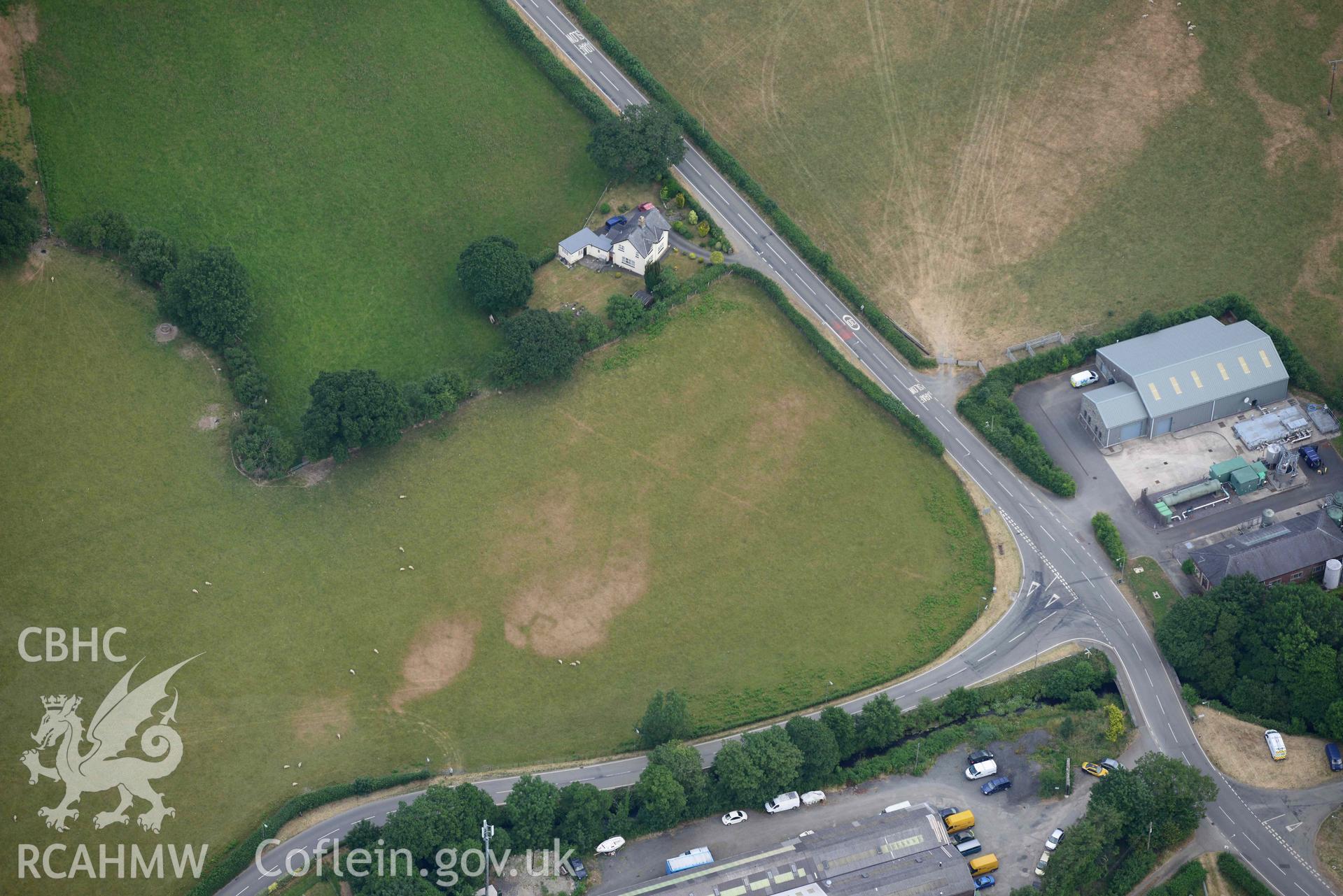 Aerial photograph: Bryncrug, Pont y Felindre, square barrow cemetery. Crown: CHERISH PROJECT 2018. Produced with EU funds through the Ireland Wales Co-operation Programme 2014-2020 (NGR SH613032)