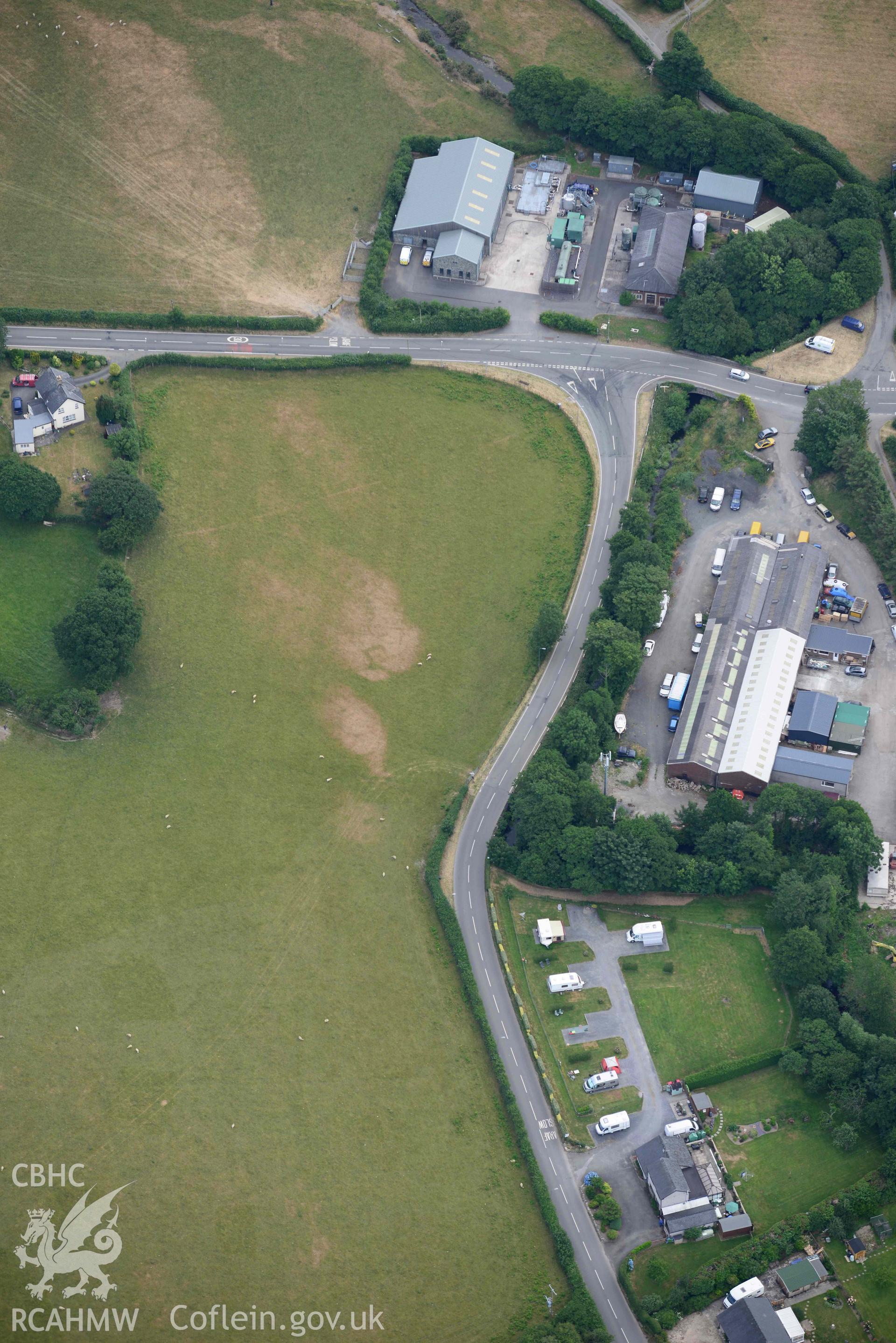 Aerial photograph: Bryncrug, Pont y Felindre, square barrow cemetery. Crown: CHERISH PROJECT 2018. Produced with EU funds through the Ireland Wales Co-operation Programme 2014-2020 (NGR SH613032)