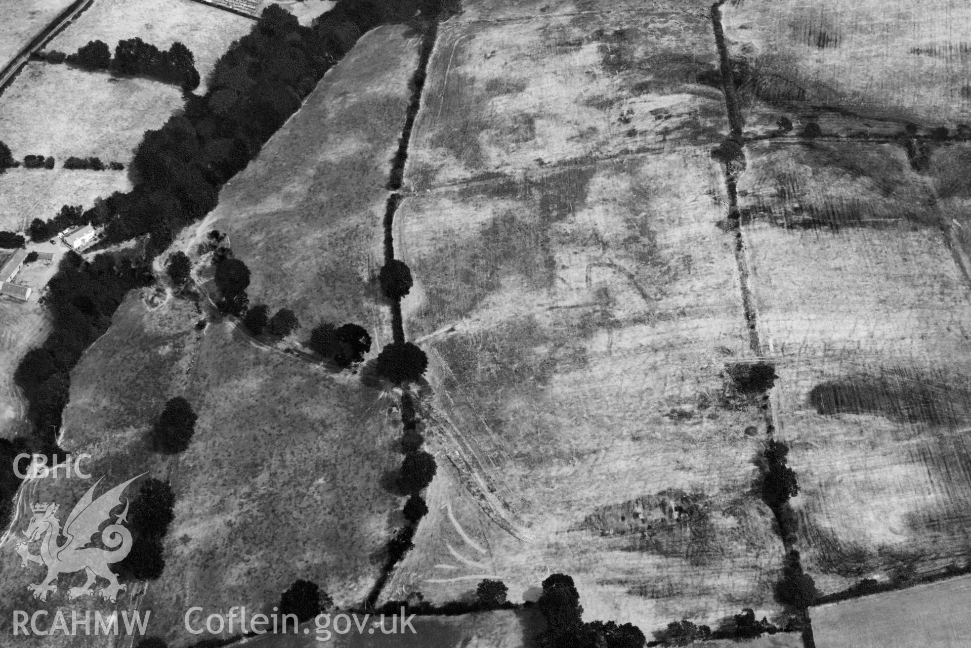 Aerial photograph: Gellifadog defended enclosure cropmark, view from west. Crown: CHERISH PROJECT 2018. Produced with EU funds through the Ireland Wales Co-operation Programme 2014-2020 (NGR SN654821)