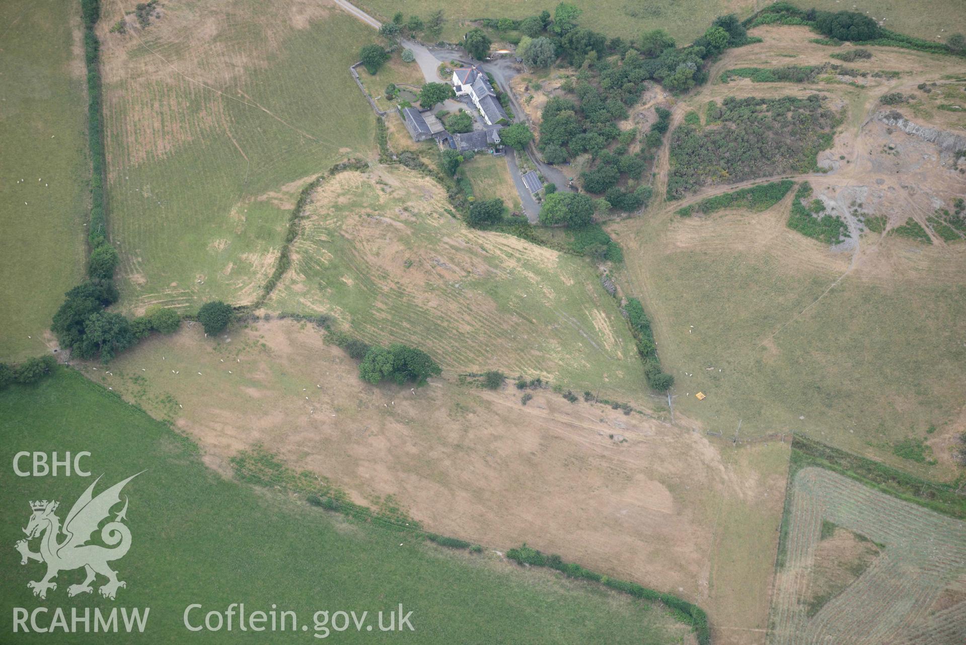 Aerial photograph: Braichyrhenllys, parchmarks of ring ditch or circular enclosure south-east of farm. Crown: CHERISH PROJECT 2018. Produced with EU funds through the Ireland Wales Co-operation Programme 2014-2020 (NGR SH615034)