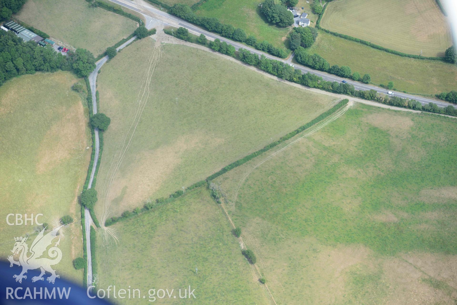 Aerial photograph: Odyn Fach; non-archaeological cropmarks in field to north west of enclosure. Crown: CHERISH PROJECT 2018. Produced with EU funds through the Ireland Wales Co-operation Programme 2014-2020 (NGR SN644877)