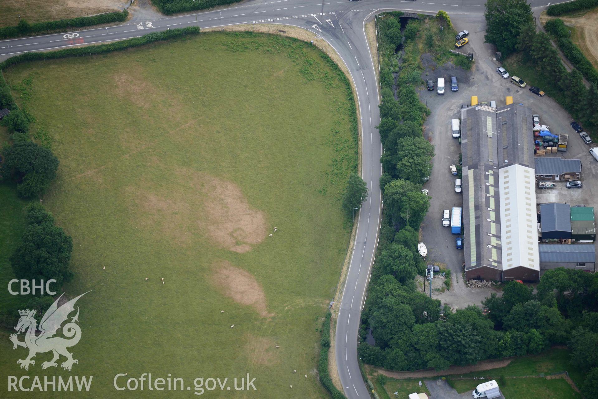 Aerial photograph: Bryncrug, Pont y Felindre, square barrow cemetery. Crown: CHERISH PROJECT 2018. Produced with EU funds through the Ireland Wales Co-operation Programme 2014-2020 (NGR SH613032)