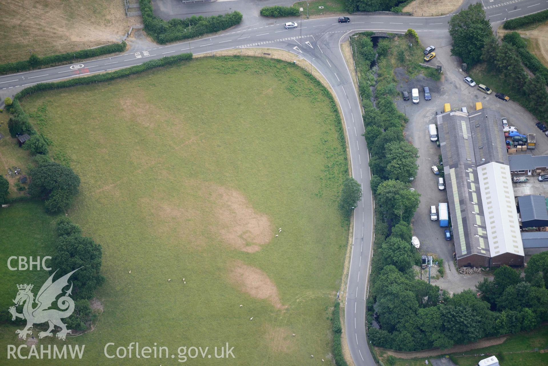 Aerial photograph: Bryncrug, Pont y Felindre, square barrow cemetery. Crown: CHERISH PROJECT 2018. Produced with EU funds through the Ireland Wales Co-operation Programme 2014-2020 (NGR SH613032)