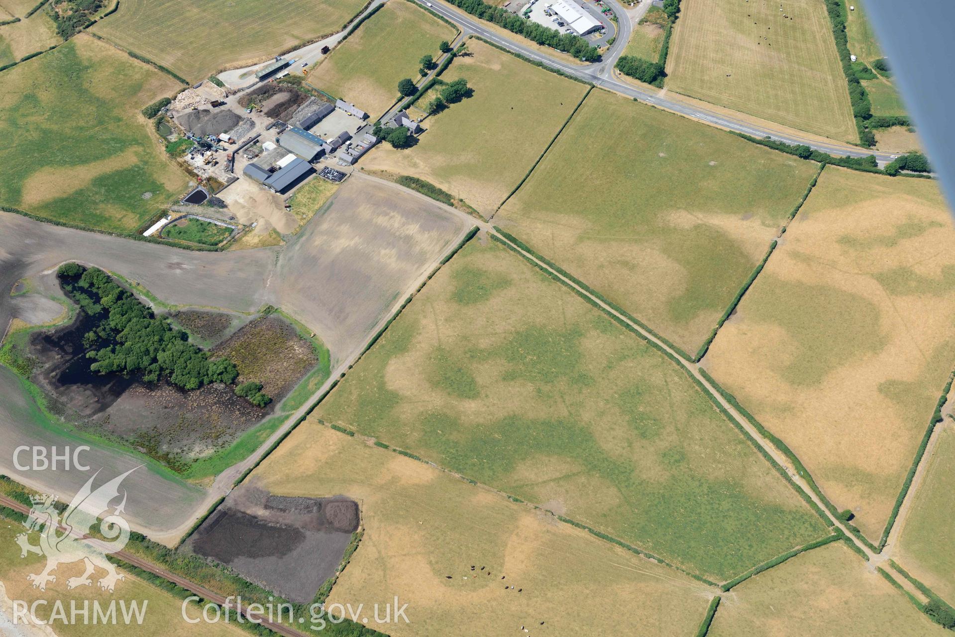 Aerial photograph: Glanllynnau early field system cropmarks, view from south-east. Crown: CHERISH PROJECT 2018. Produced with EU funds through the Ireland Wales Co-operation Programme 2014-2020 (NGR SH458376)