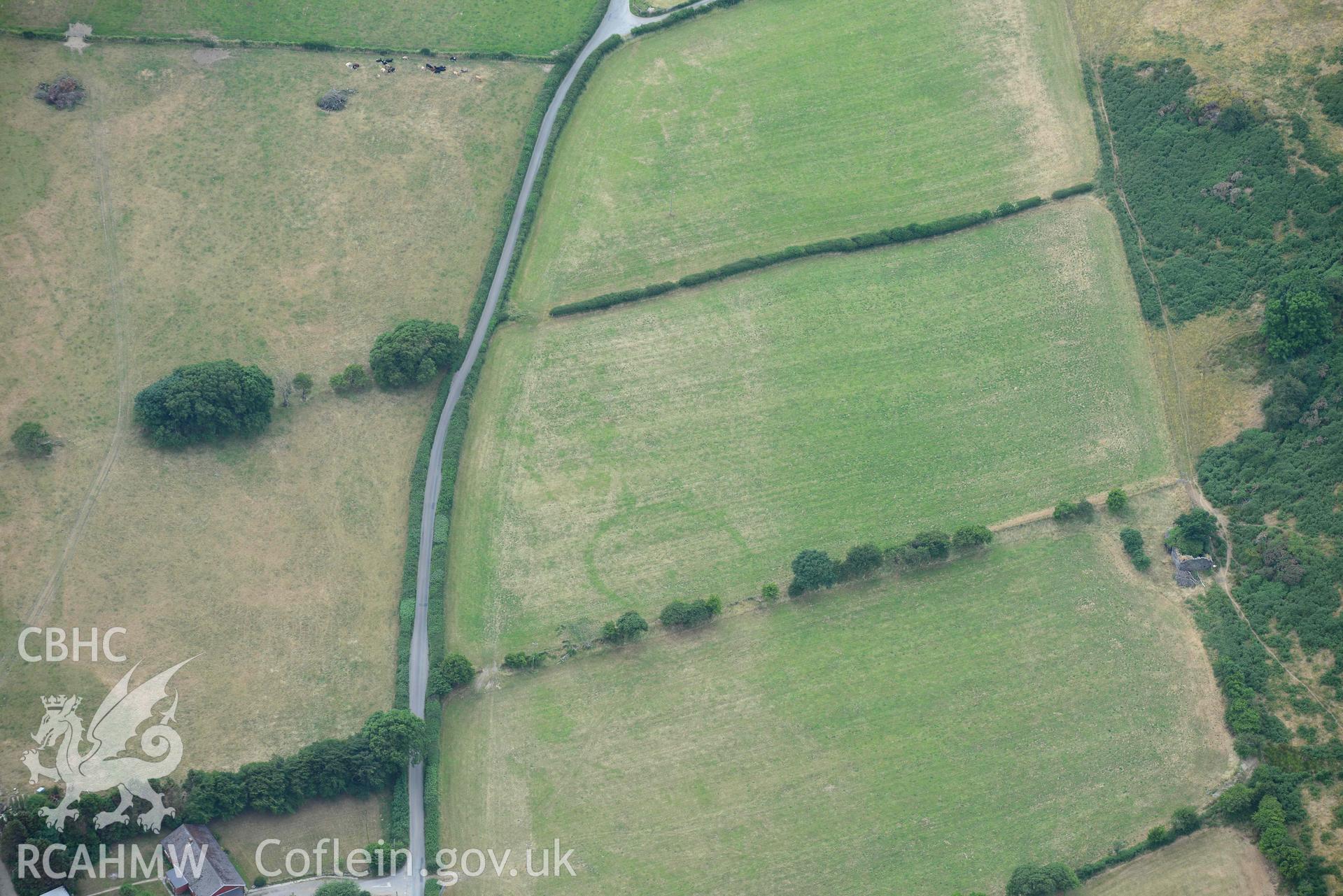 Aerial photograph: Allt-lwyd, Cwm Maethlon round barrow cropmarks. Crown: CHERISH PROJECT 2018. Produced with EU funds through the Ireland Wales Co-operation Programme 2014-2020 (NGR SH631985)