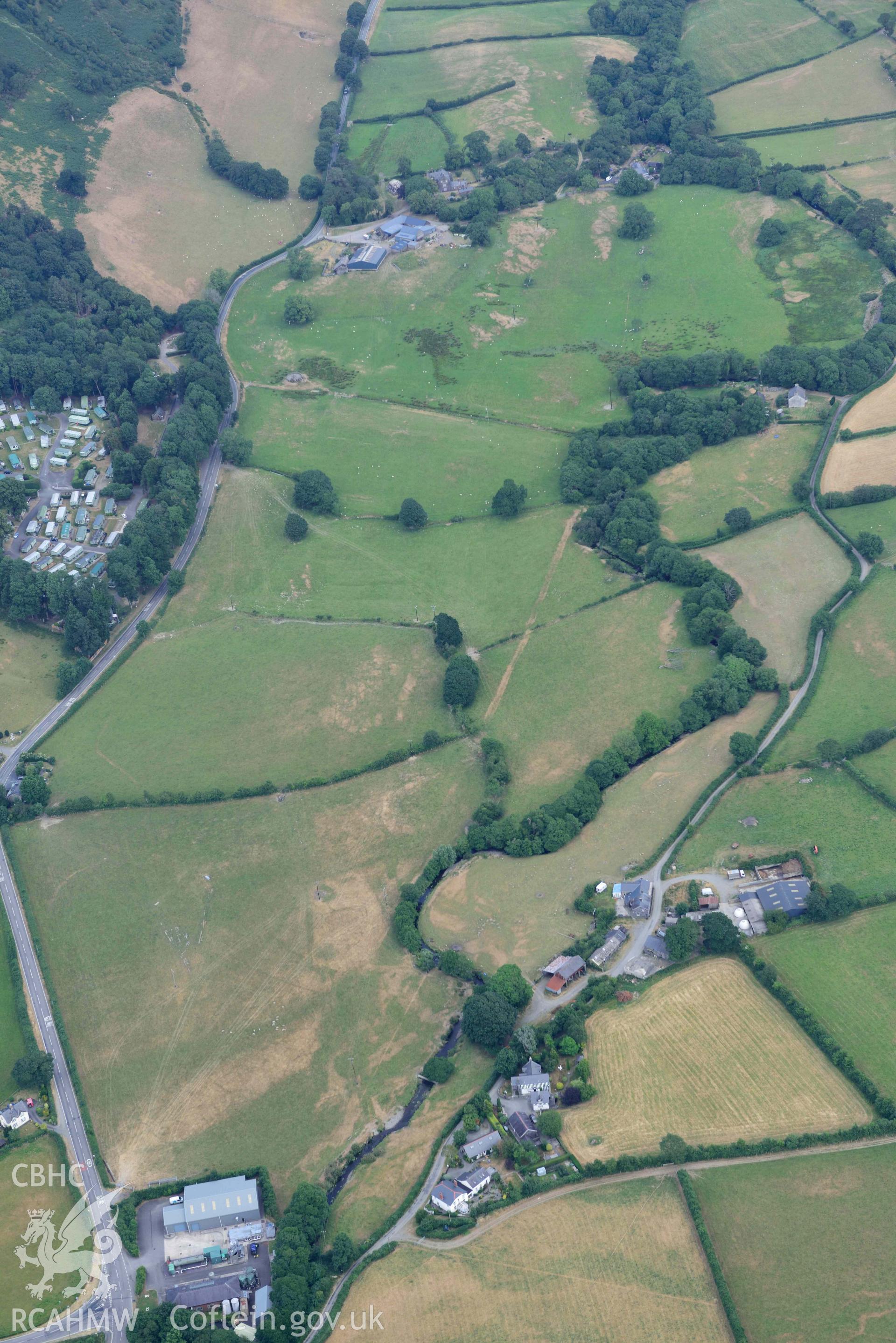 Aerial photograph: Bryncrug, Pont y Felindre cropmark complex. Crown: CHERISH PROJECT 2018. Produced with EU funds through the Ireland Wales Co-operation Programme 2014-2020 (NGR SH616031)