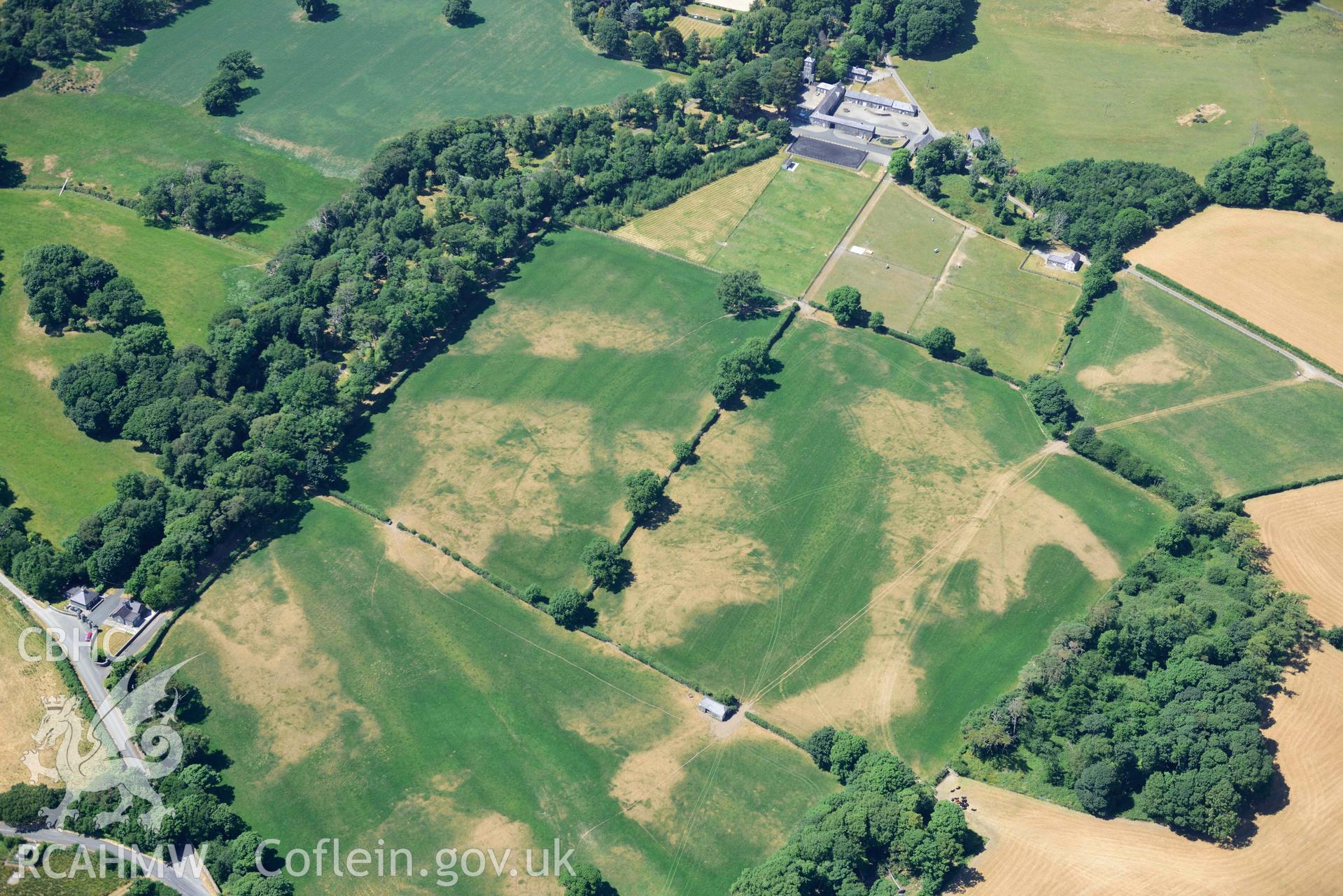 Aerial photograph: Broom Hall parkland; sundry cropmarks of relict field systems to south-east of stables. Crown: CHERISH PROJECT 2018. Produced with EU funds through the Ireland Wales Co-operation Programme 2014-2020 (NGR SH416369)