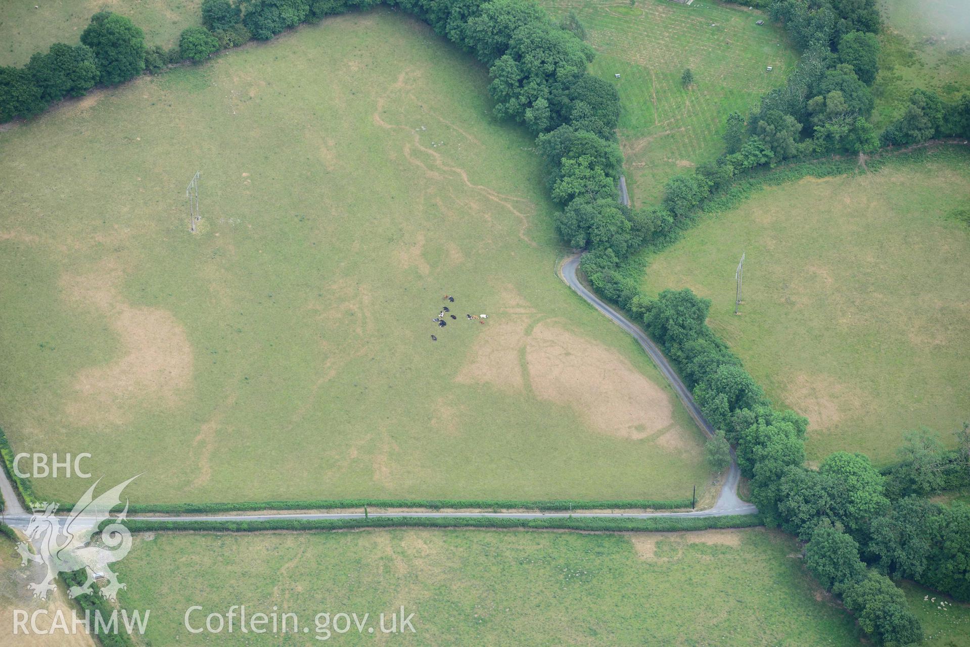 Aerial photograph: Pentre, defended enclosure cropmark. Crown: CHERISH PROJECT 2018. Produced with EU funds through the Ireland Wales Co-operation Programme 2014-2020 (NGR SN621504)