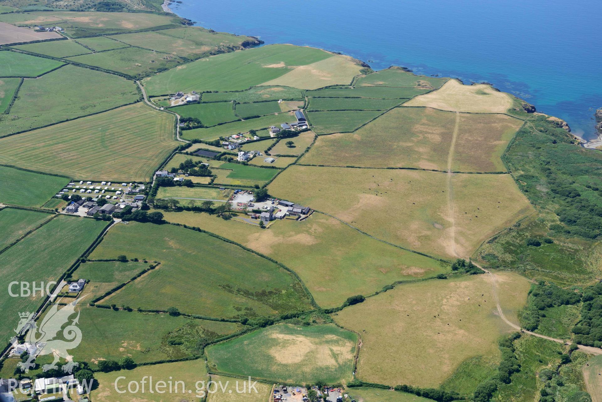 Aerial photograph: Pwll Parc cropmark enclosure, view from east. Crown: CHERISH PROJECT 2018. Produced with EU funds through the Ireland Wales Co-operation Programme 2014-2020 (NGR SH269400)