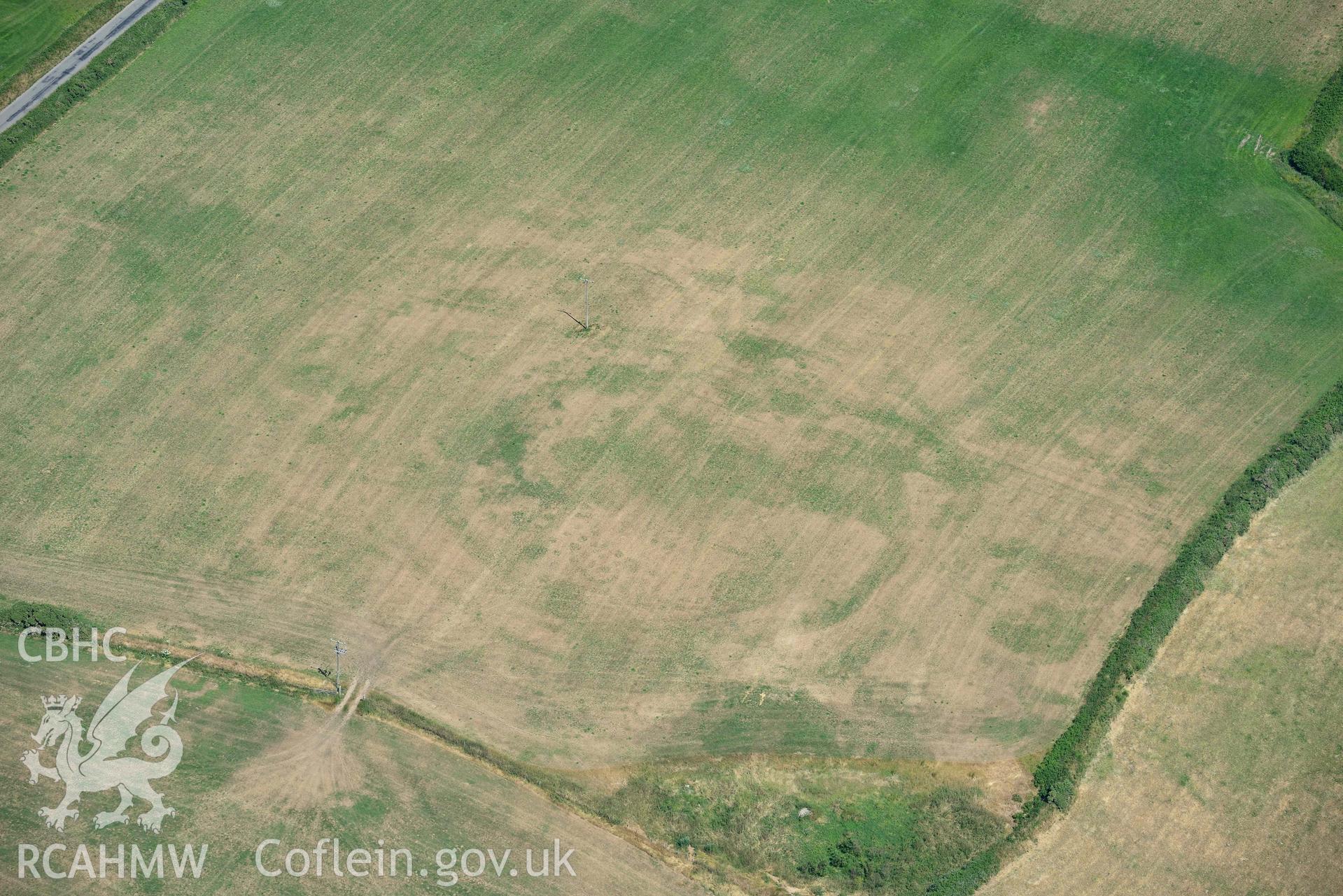 Aerial photograph: Bryniau or Bryn Rhydd cropmark enclosure. Crown: CHERISH PROJECT 2018. Produced with EU funds through the Ireland Wales Co-operation Programme 2014-2020 (NGR SH265387)